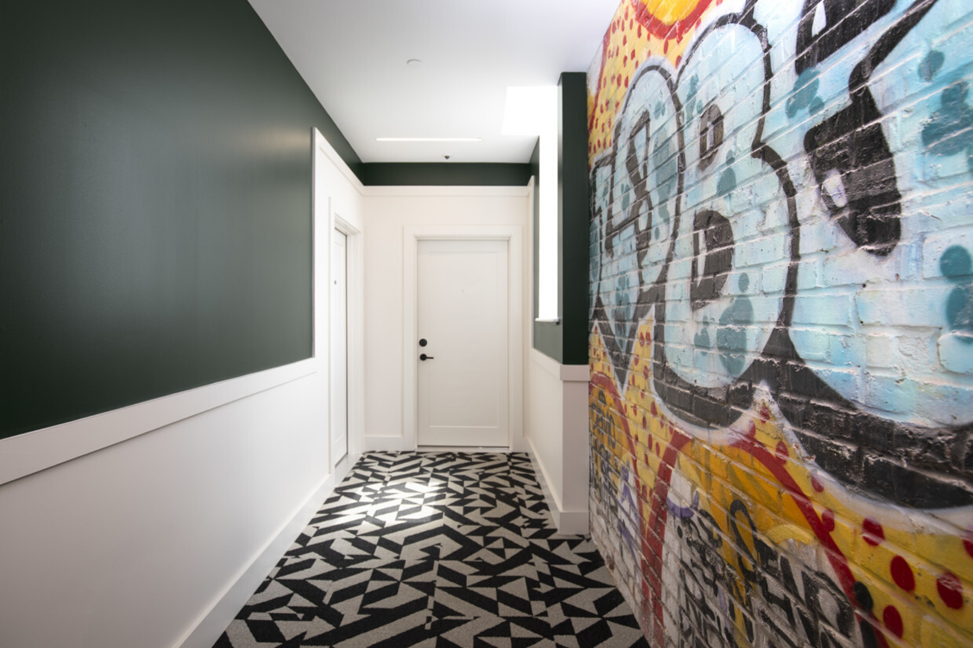 20_Irvine Apartments_Restored Grafitti Hallway Art_Rehabilitated.png