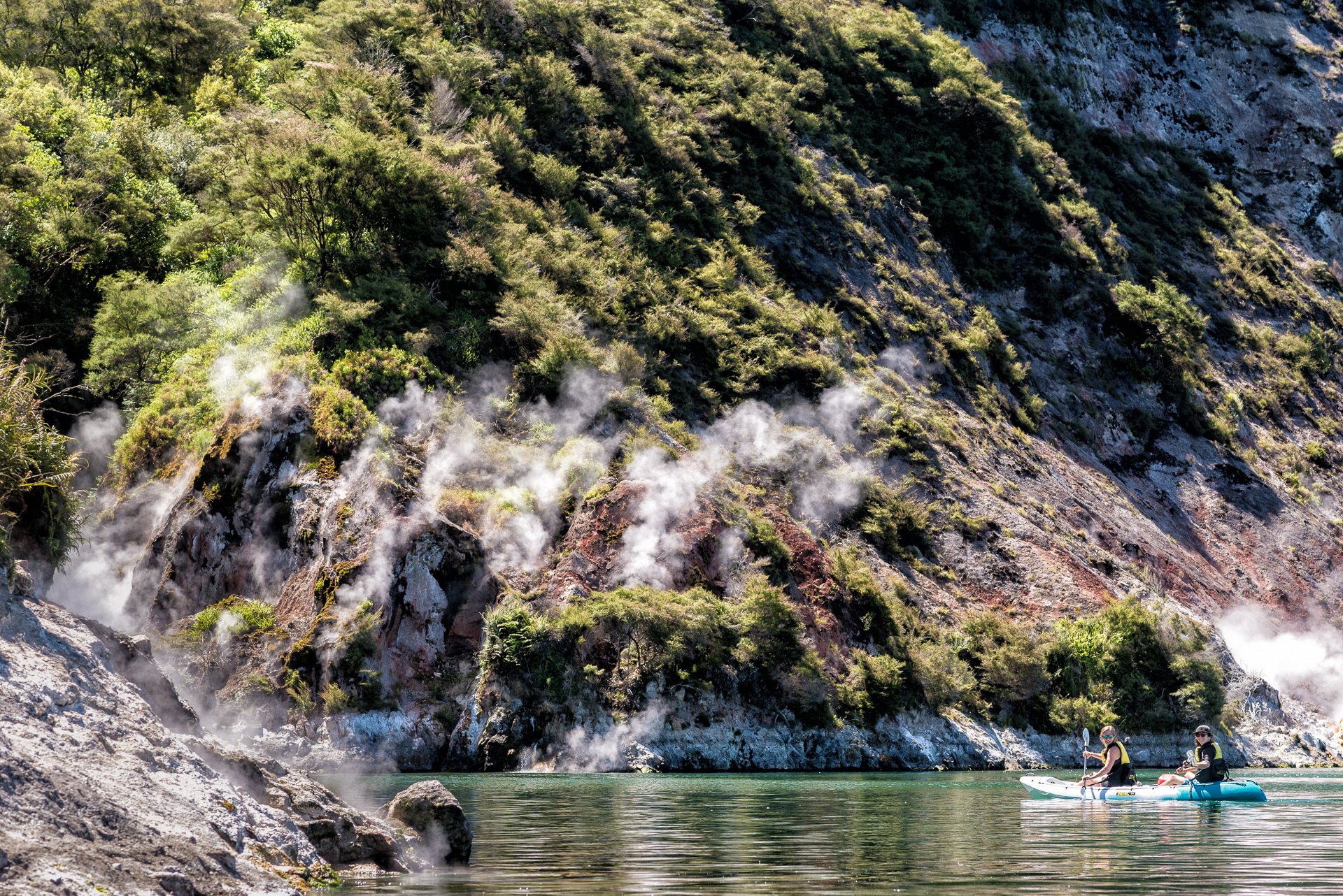 Kayakers dwarfed by the imposing Steaming Cliffs.jpg