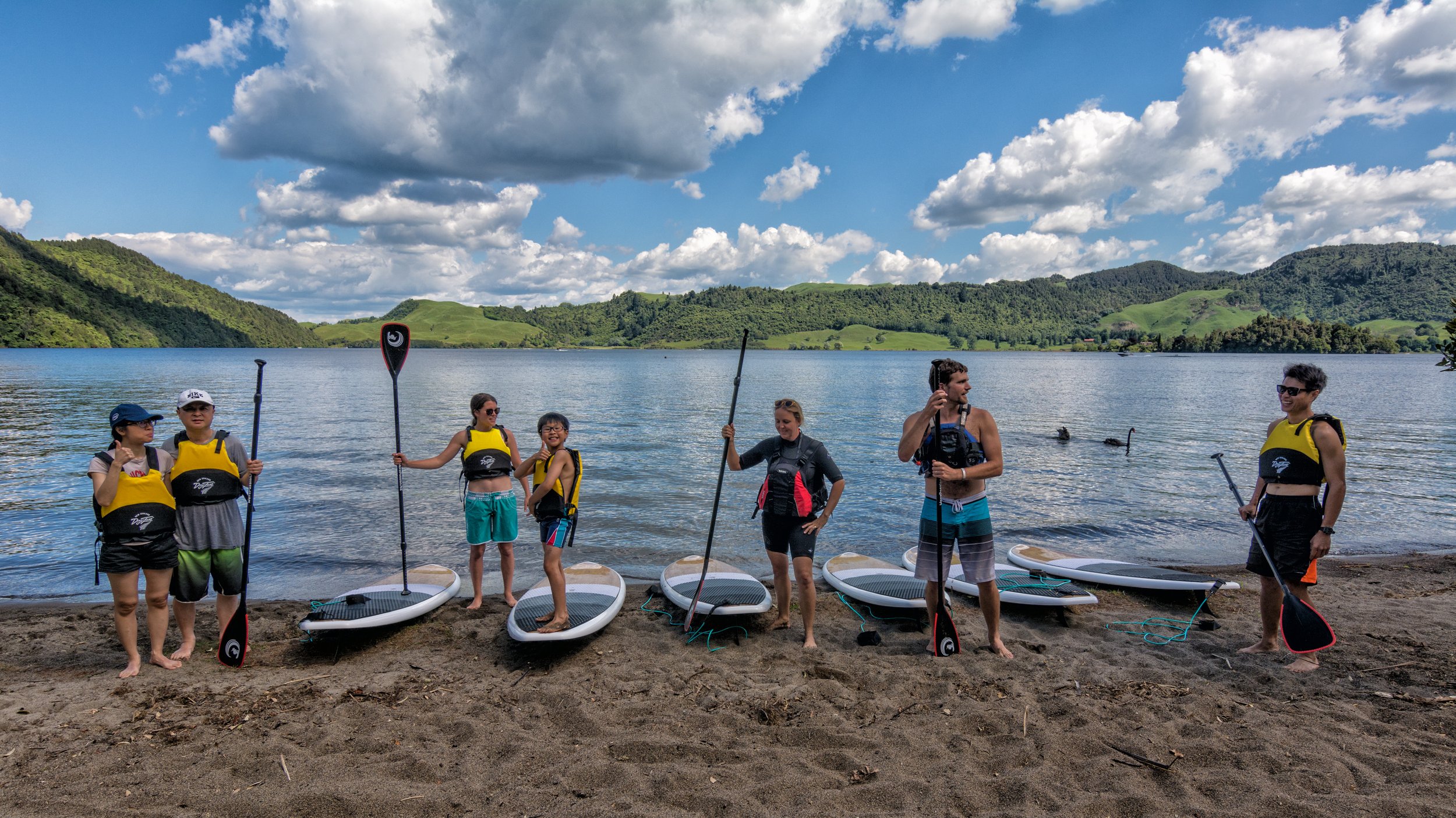 Guide and Group Standing On Land.jpg