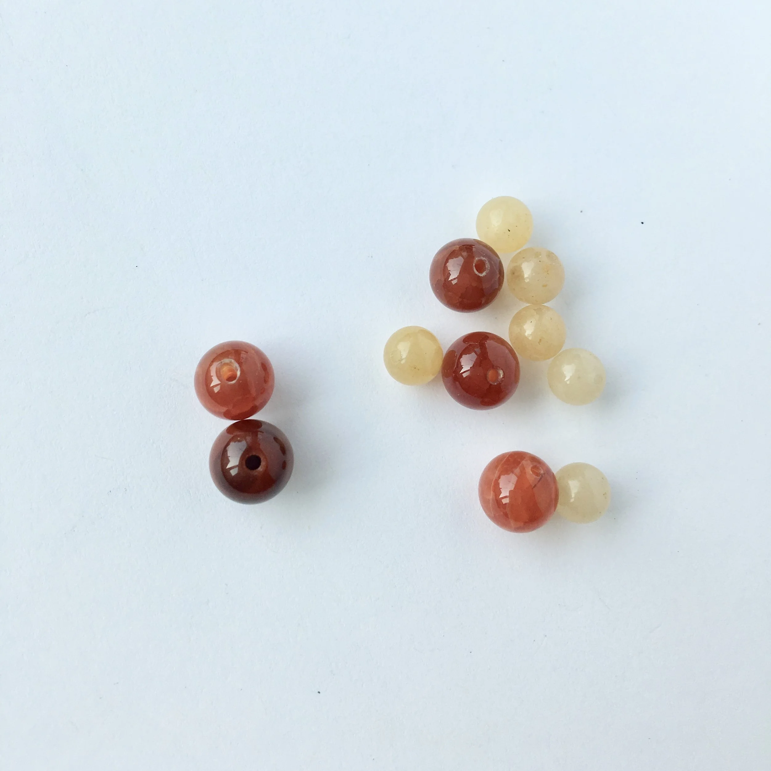 Agate: Grounding and balancing. Balances the Root Chakra. Protection, strength.