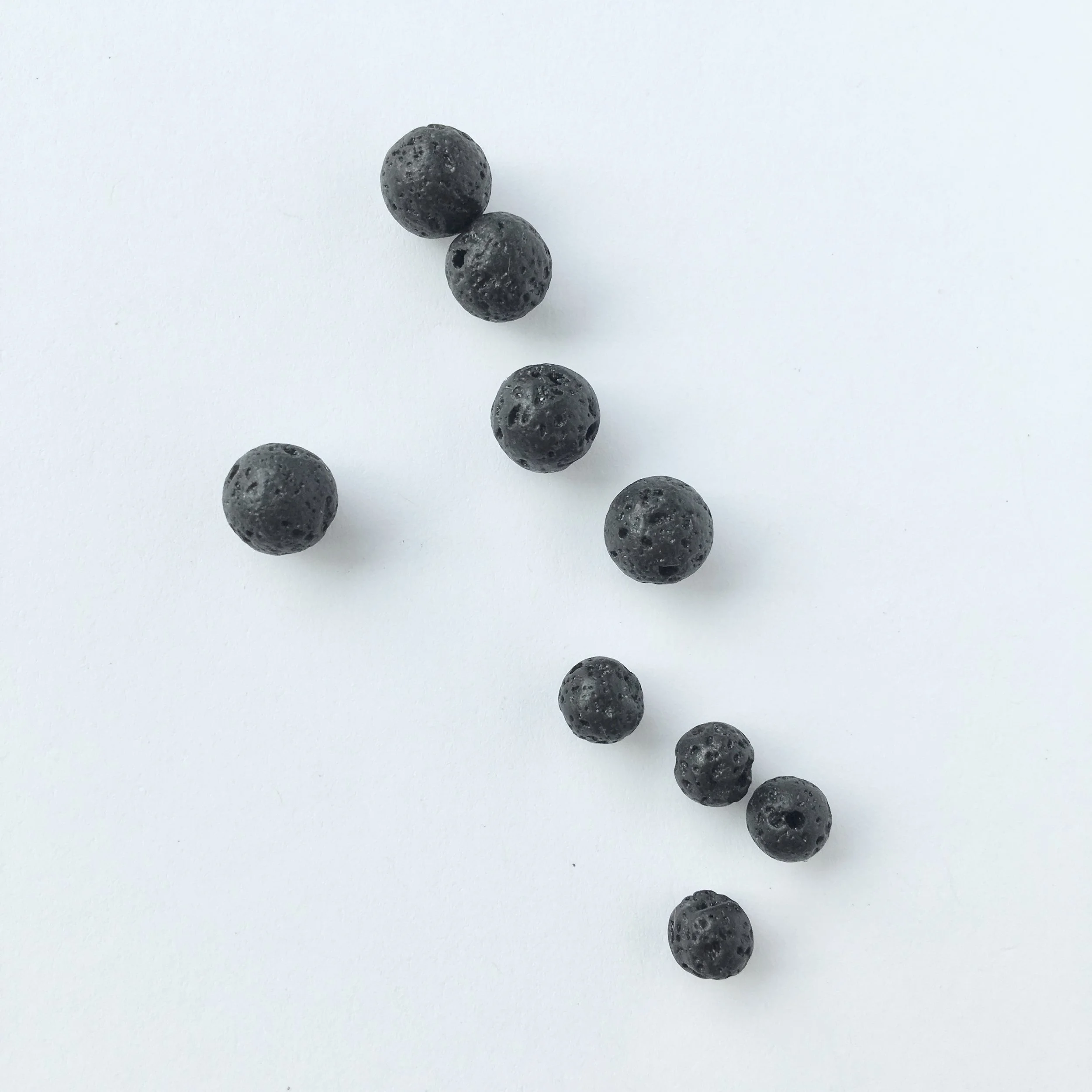 Lava Stone: Strength under pressure. Connects to the earth. Use for balance and with essential oils.