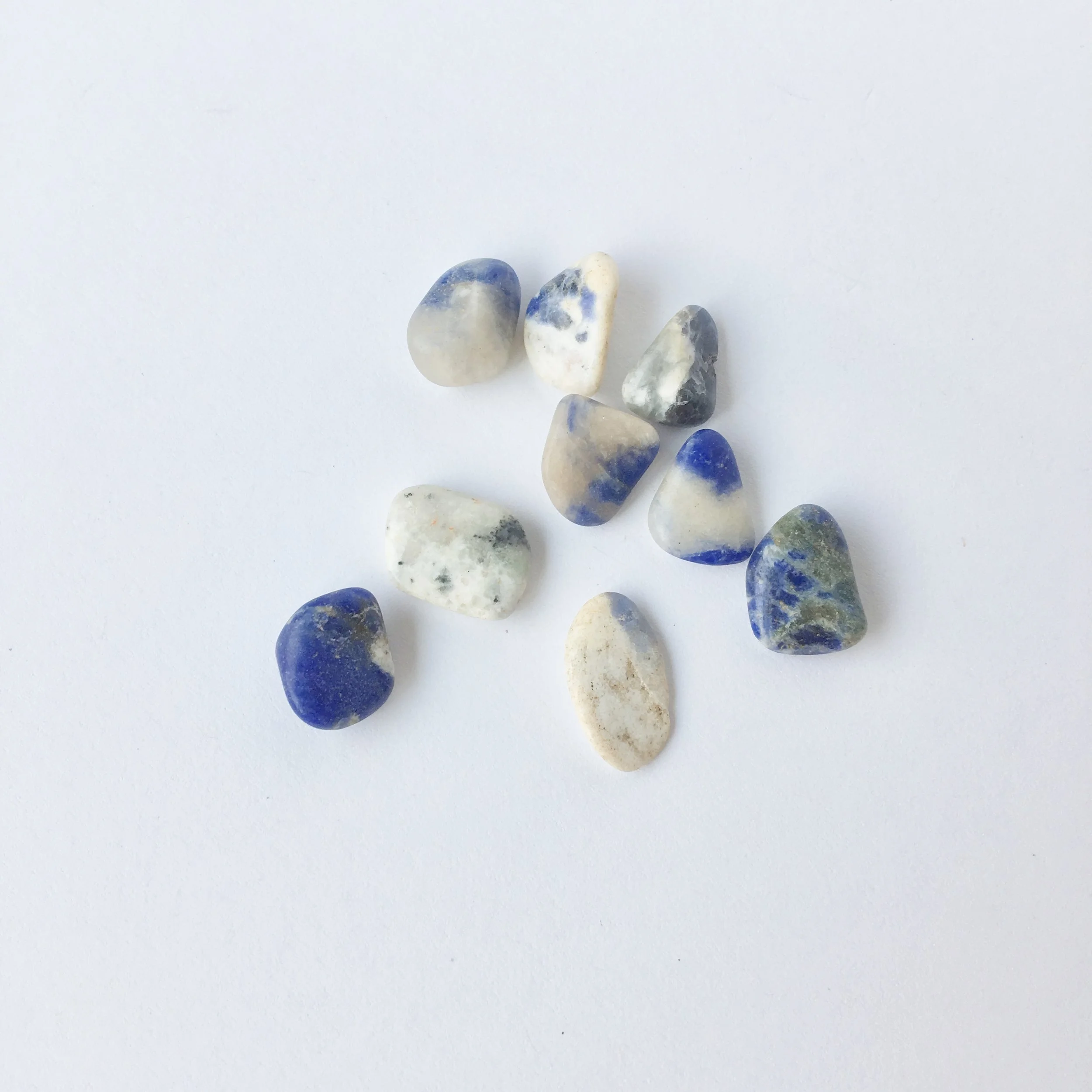 Sodalite: Improves communication, balances Throat Chakra, promotes peace, meditation.
