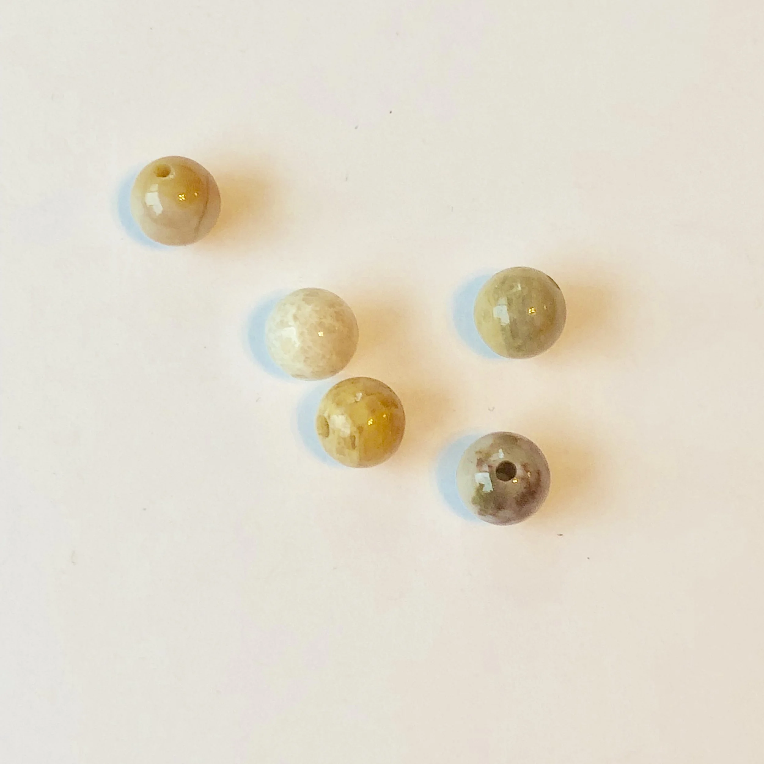 Flowerstone: Grounding, promotes connection with the natural world. Warming and soothing.