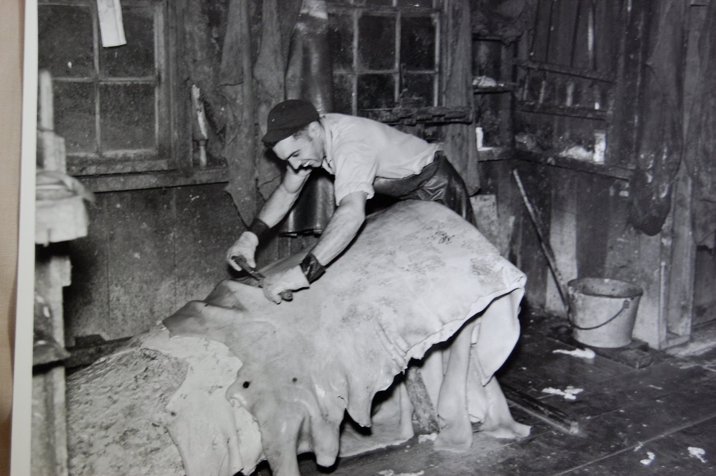 guy-scrapping-hides-1940s.jpg