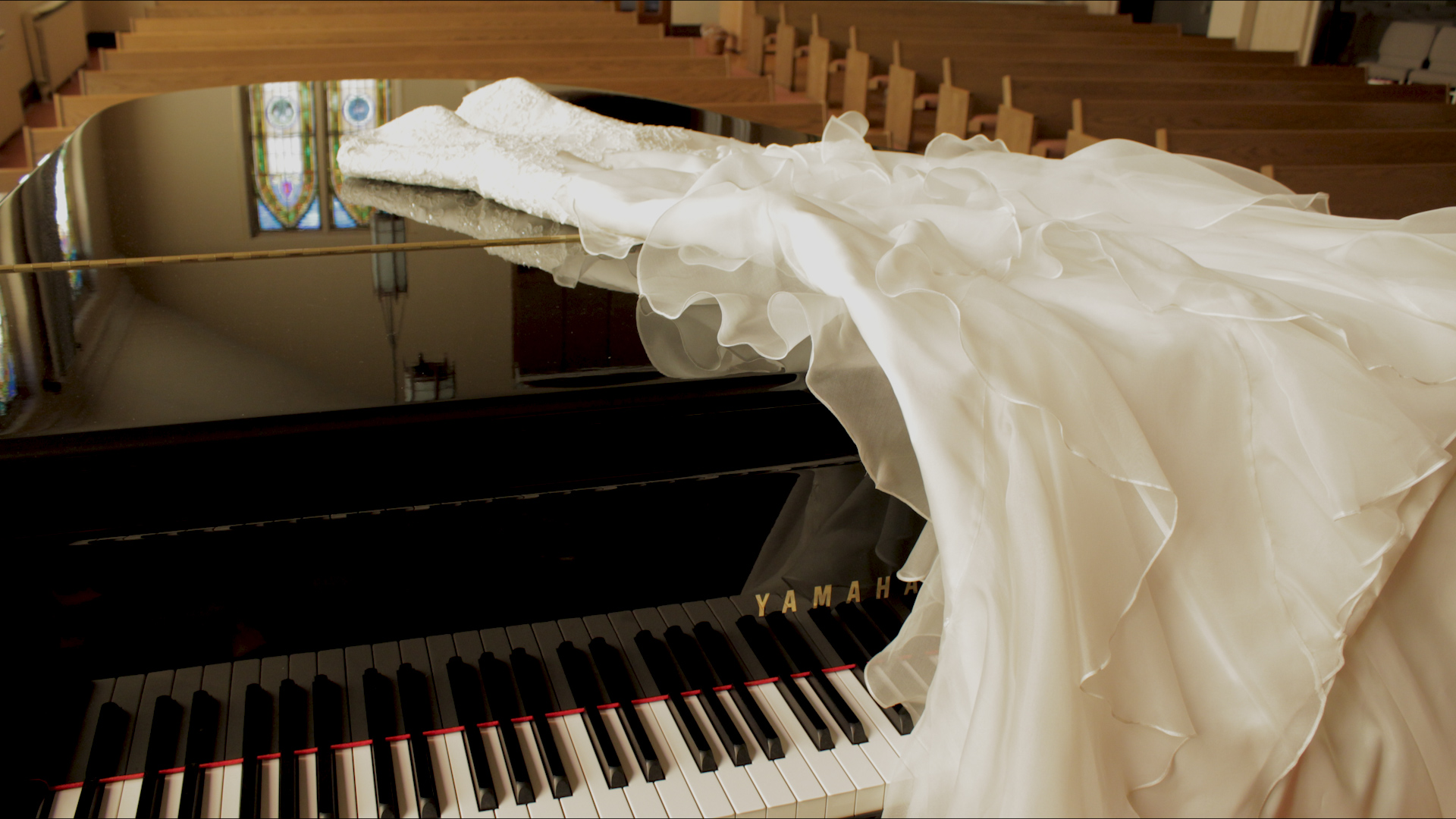 Wedding dress on piano.jpg