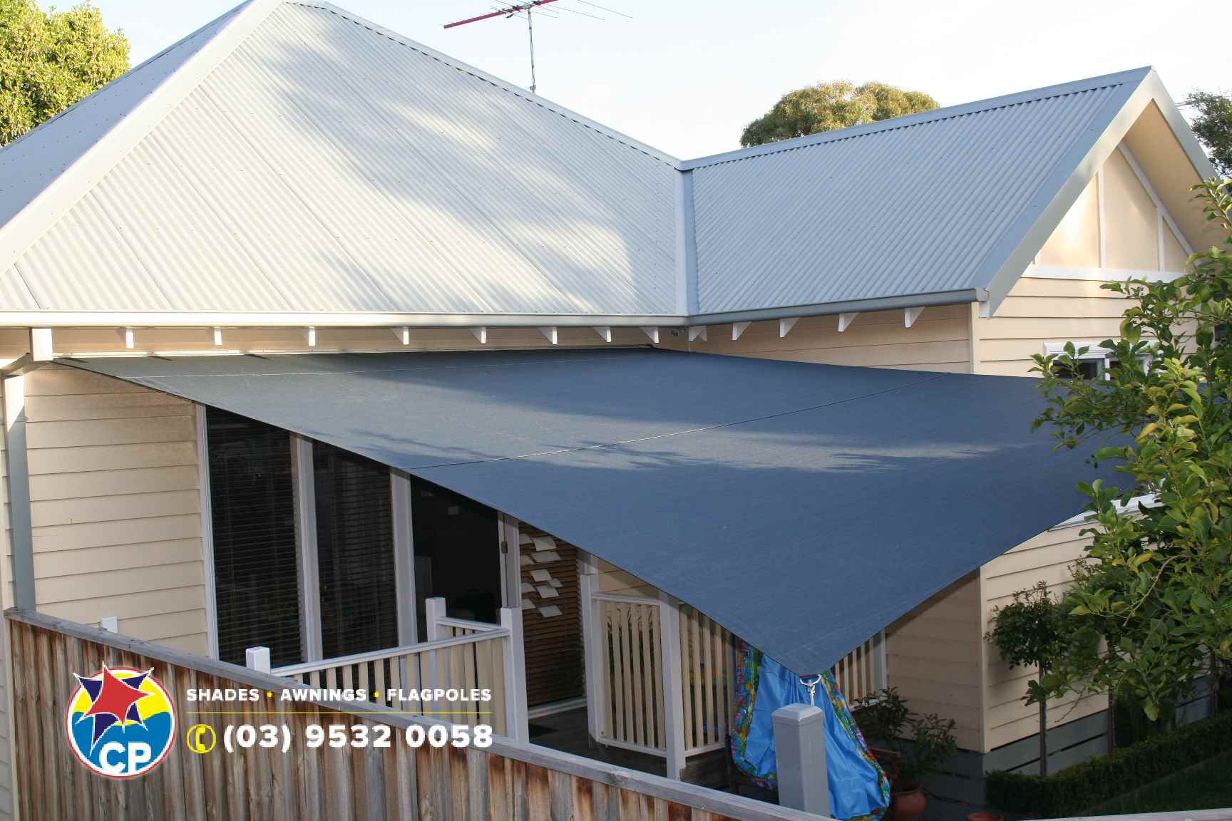 shade sail backporch green.jpg