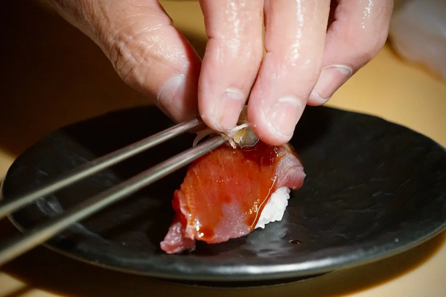 Katsuo, Bonito fish, topped with garlic paste, ginger sprouts, and soy sauce 🐟🥢

#sushi #fish #katsuo #bonito #soysauce #omakase #nigiri #sushichef #venturablvd #foodie