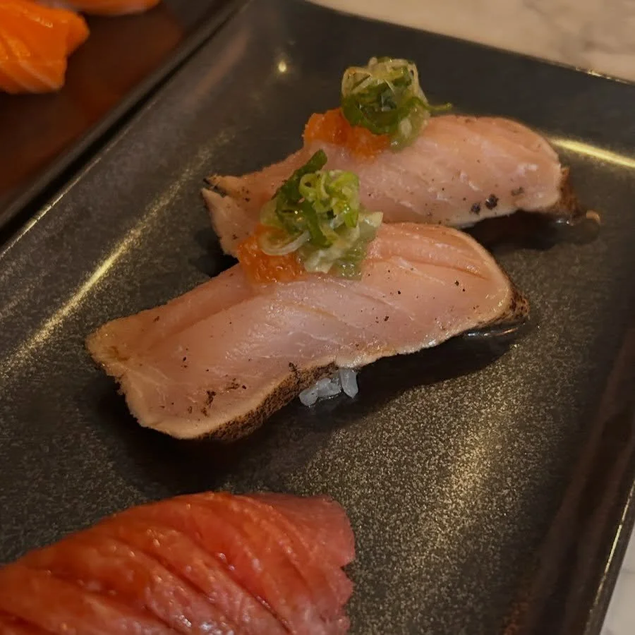 Up close and personal is the smokey, seared Peppered Albacore! Usually topped with some garlic, momoji (pickled daikon radish with chili), ponzu and green onions. This is a classic staple on the menu we loveeee🥰🥢!! 

#albacore #sushi #dinnerplans #