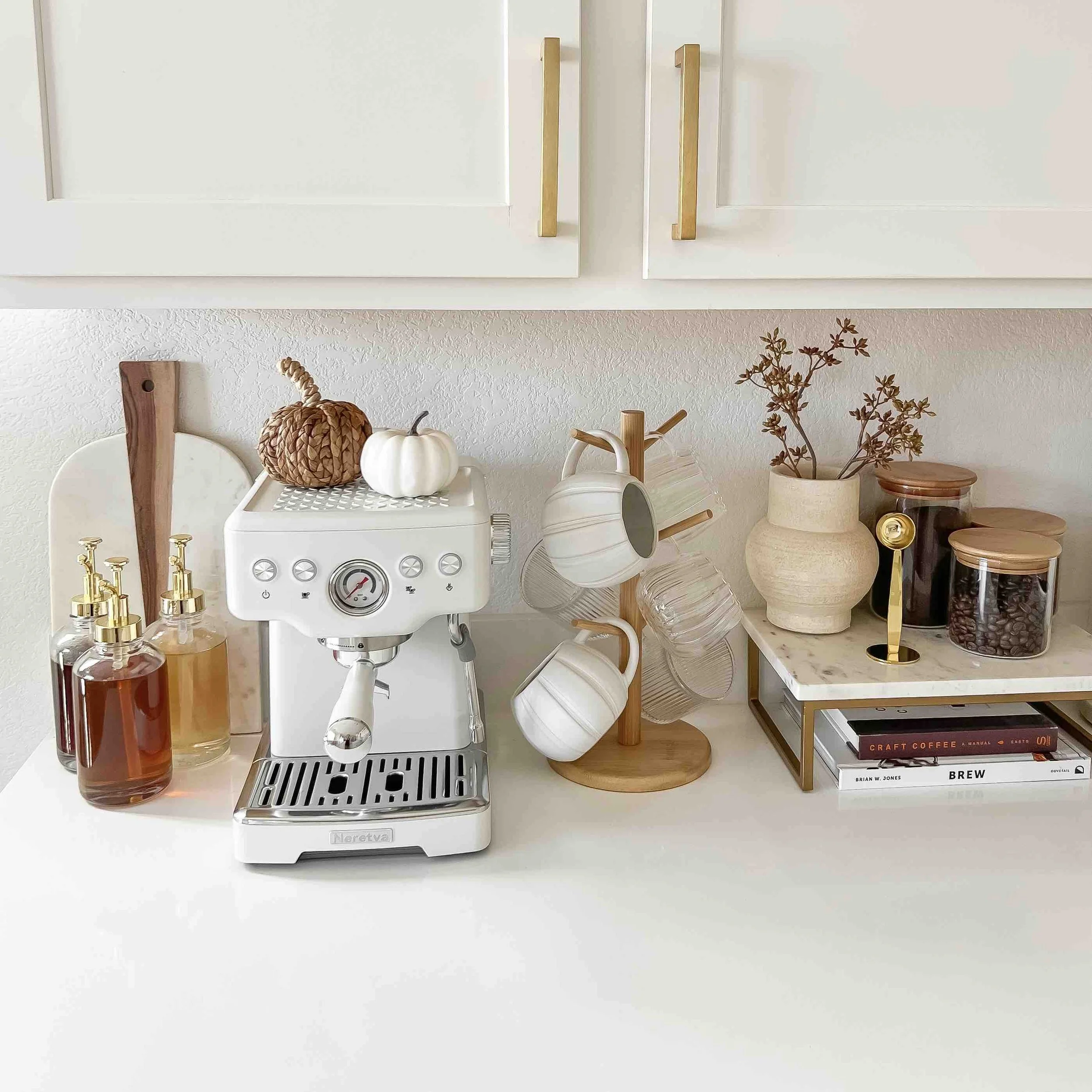  Neutral fall coffee bar styled with minimalist fall decor in a white and gold kitchen 