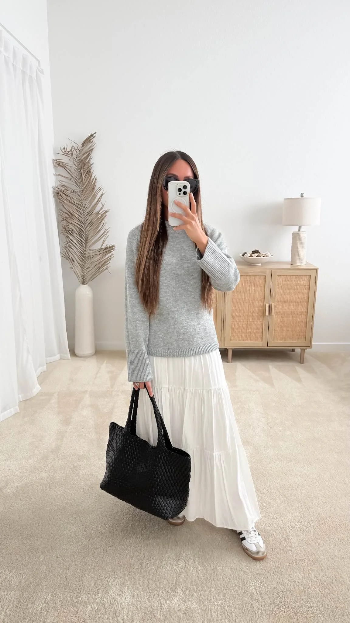 Casual spring outfit with white tiered maxi skirt, grey sweater