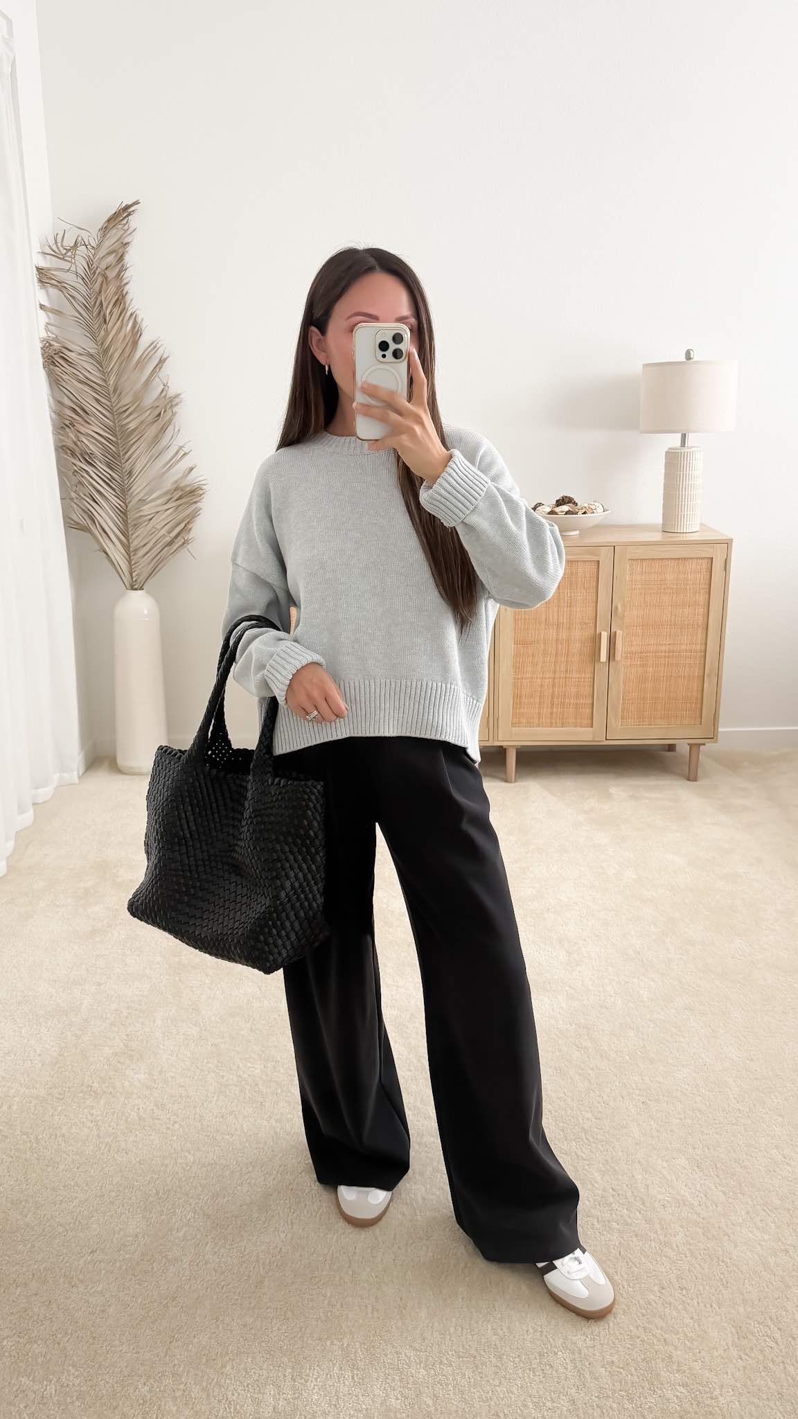Sweater with trousers outfit featuring Quince Organic Cotton Boyfriend Crew Sweater styled with black wide-leg pants and sneakers