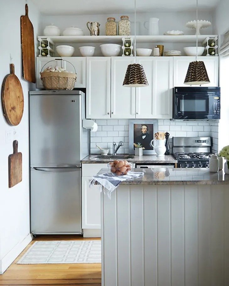 7 Trendy Ways To Decorate The Empty Space Above Kitchen Cabinets