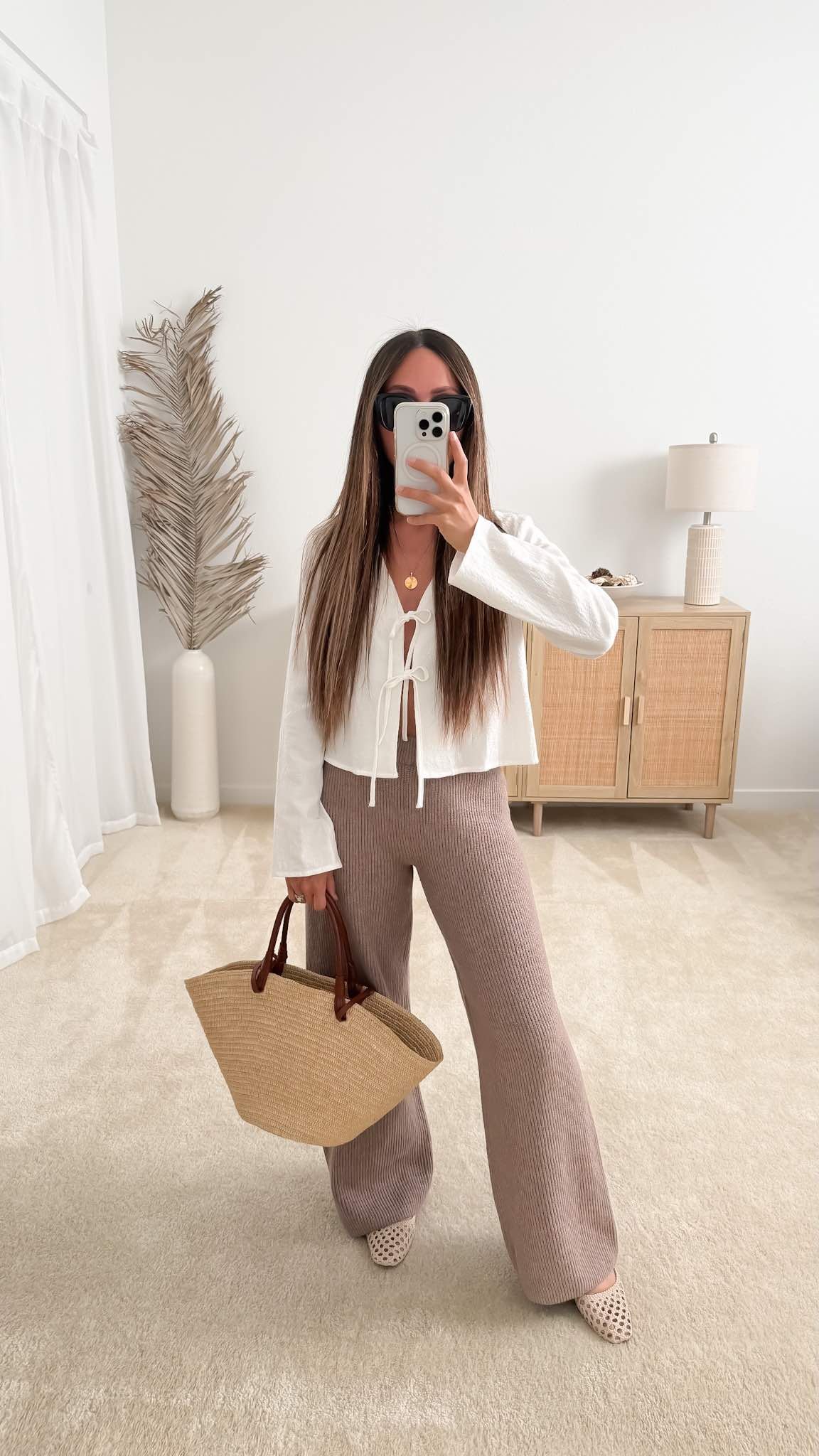 Cute spring outfit with ribbed pants, tie-front top