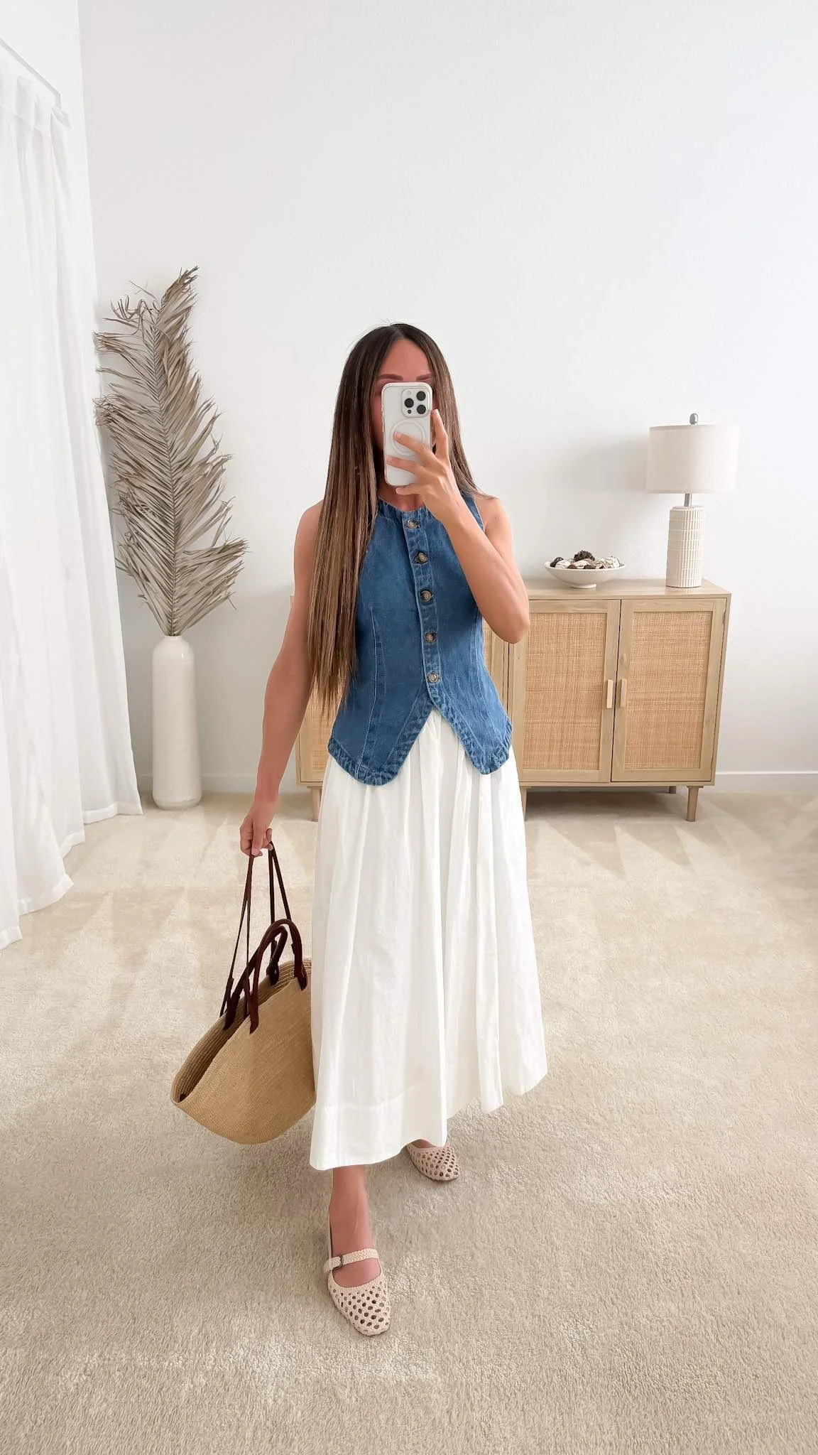 Cute spring outfit with denim vest, white midi skirt