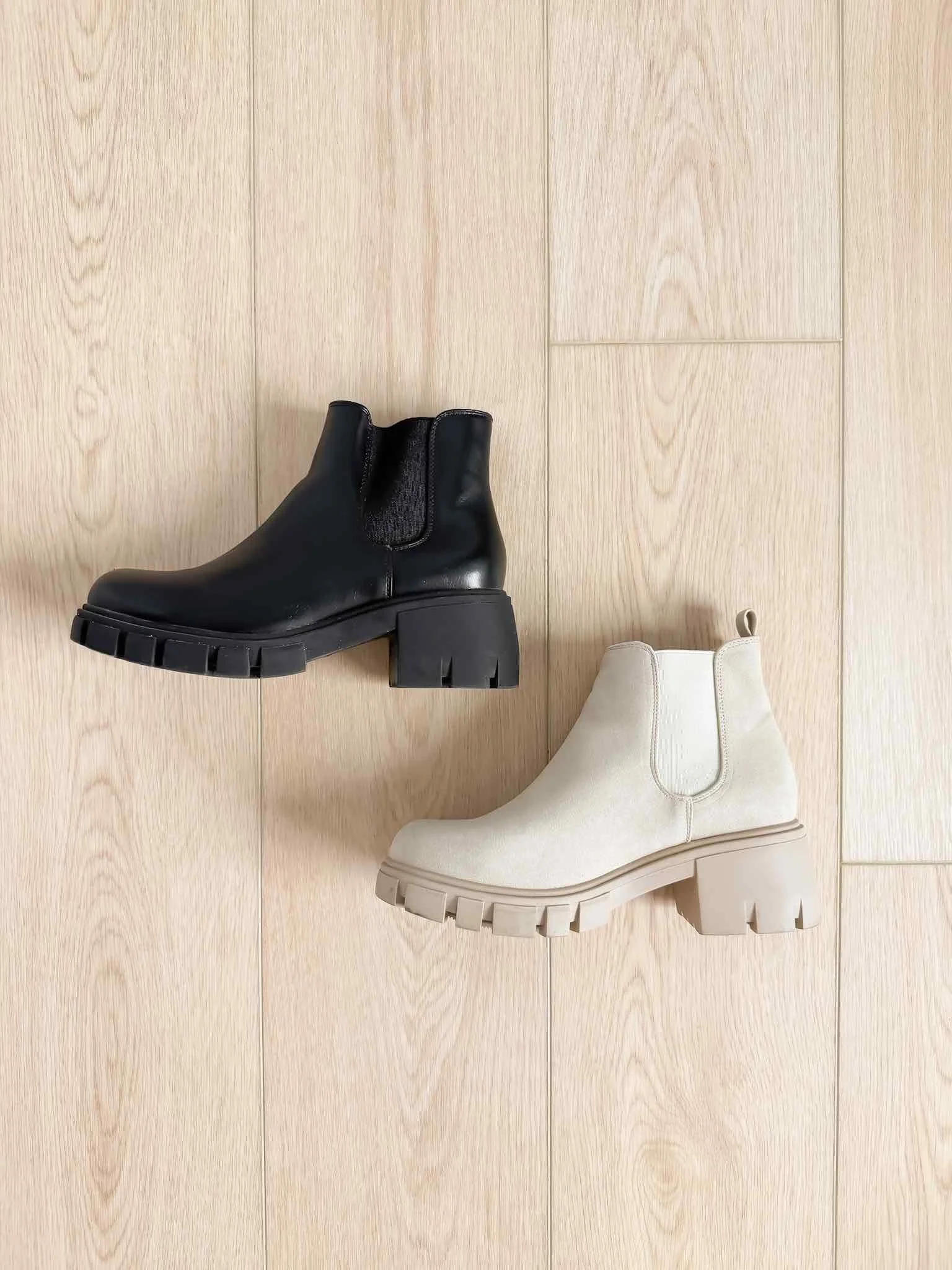 Black and cream Chelsea boots for fall with chunky block heels and lug soles