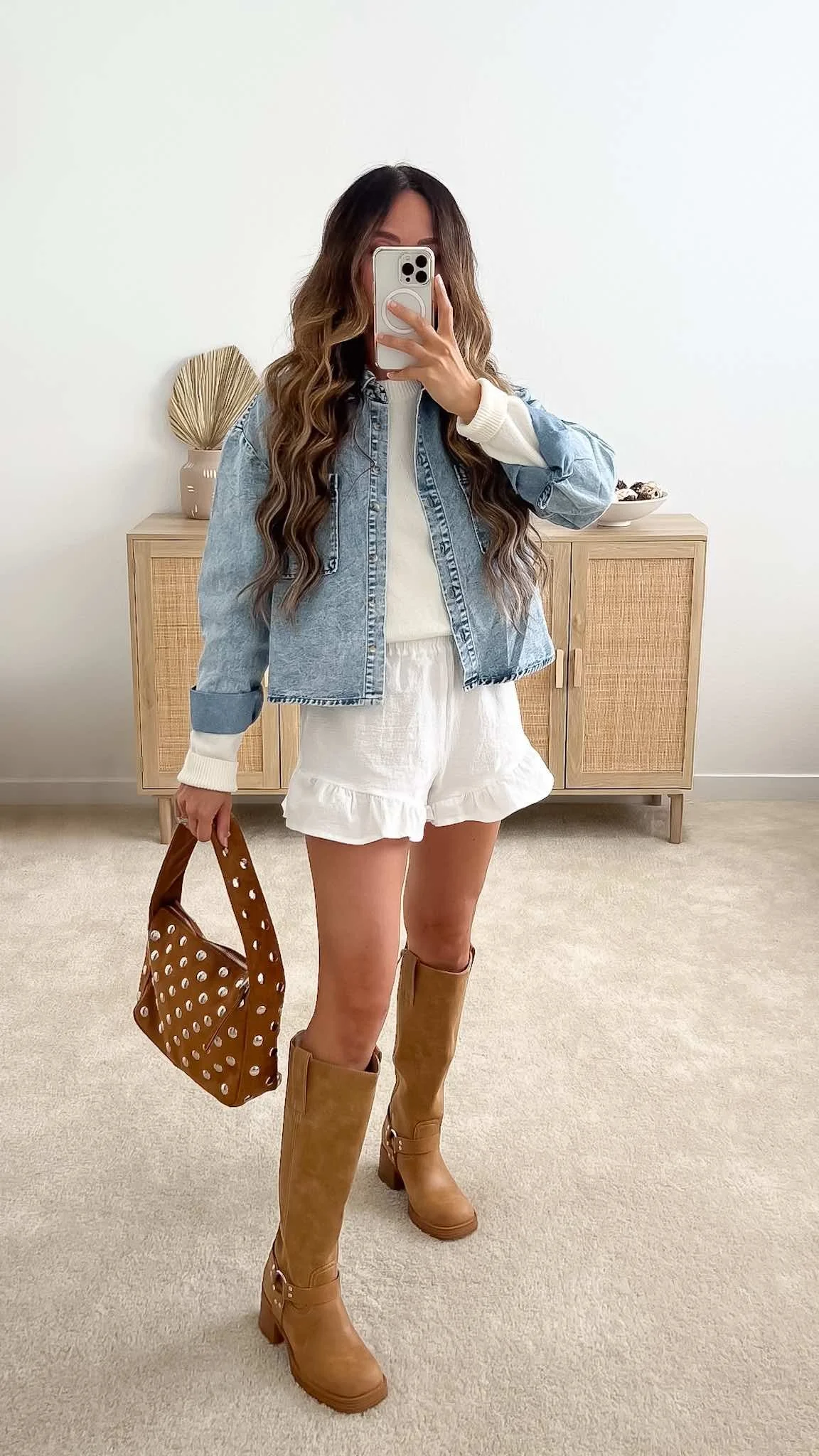 Cute spring outfit with white ruffle shorts, denim jacket