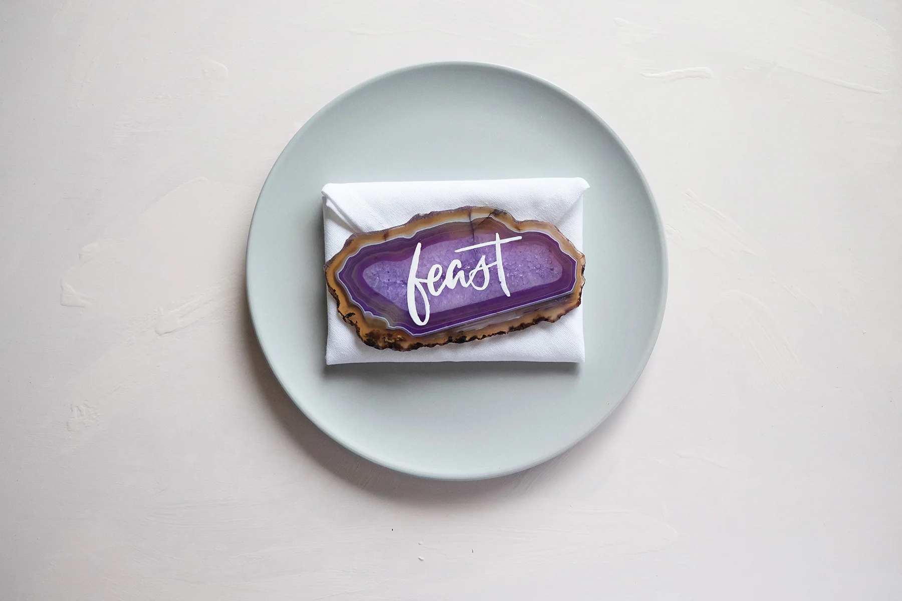 Brush lettering on agate