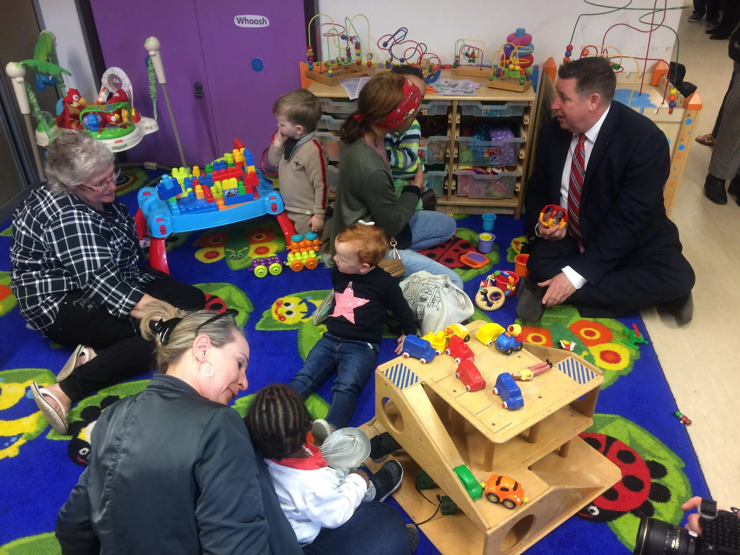 Leader of H&amp;F Council, Stephen Cowan with families.