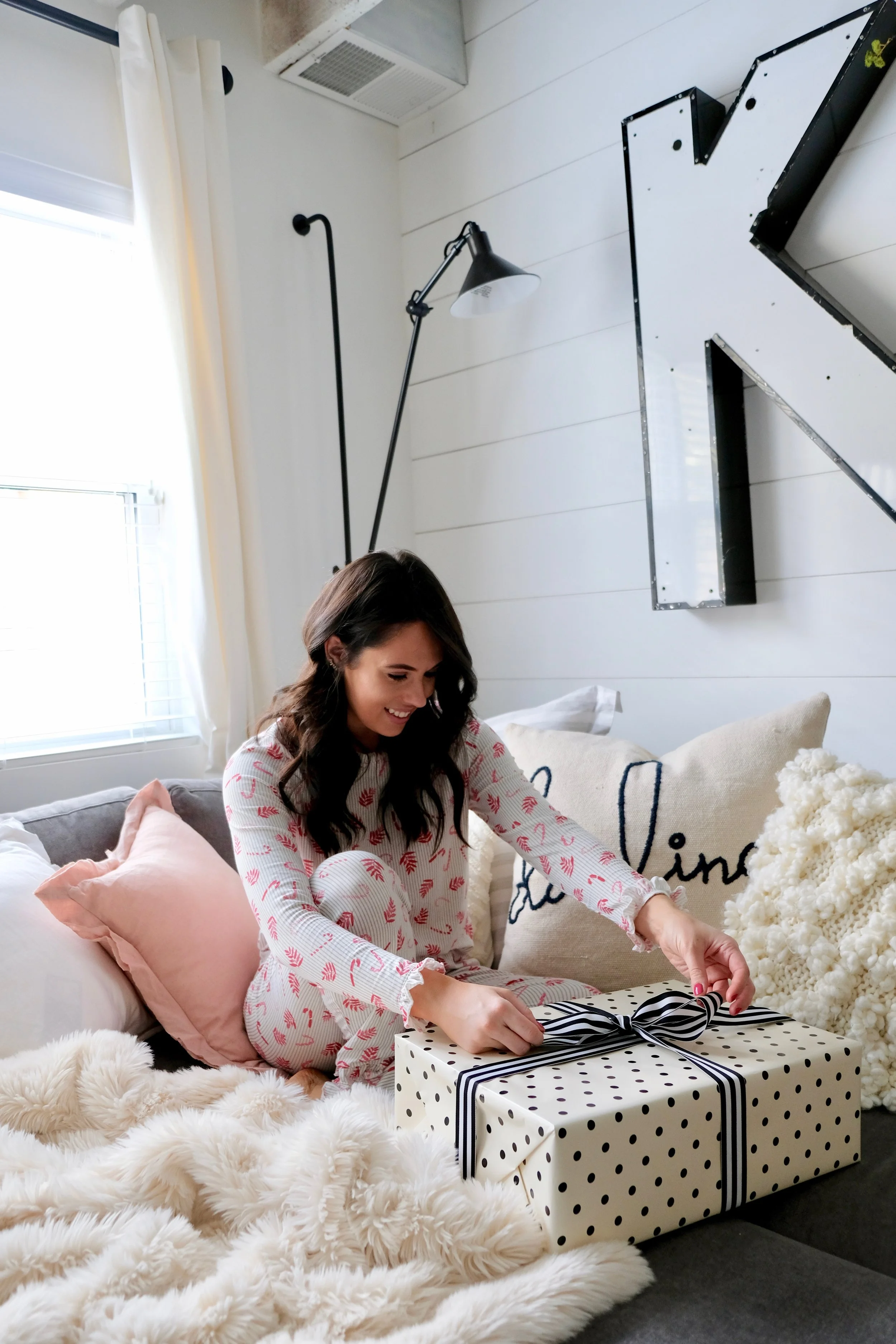 SHOP THIS PHOTO: Pajamas / Earrings / Wrapping Paper / Ribbon (way cheaper to buy this way)