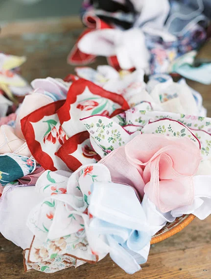 Diana created these bowls of vintage hankies for friends and family as mementos of this special day. Photo credit: Rebecca Ames Photography.
