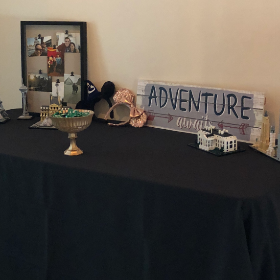 Anthony took the time to give me a tour of their wedding. He and Lynn love to travel together and on this table they share about some of their favorite trips.