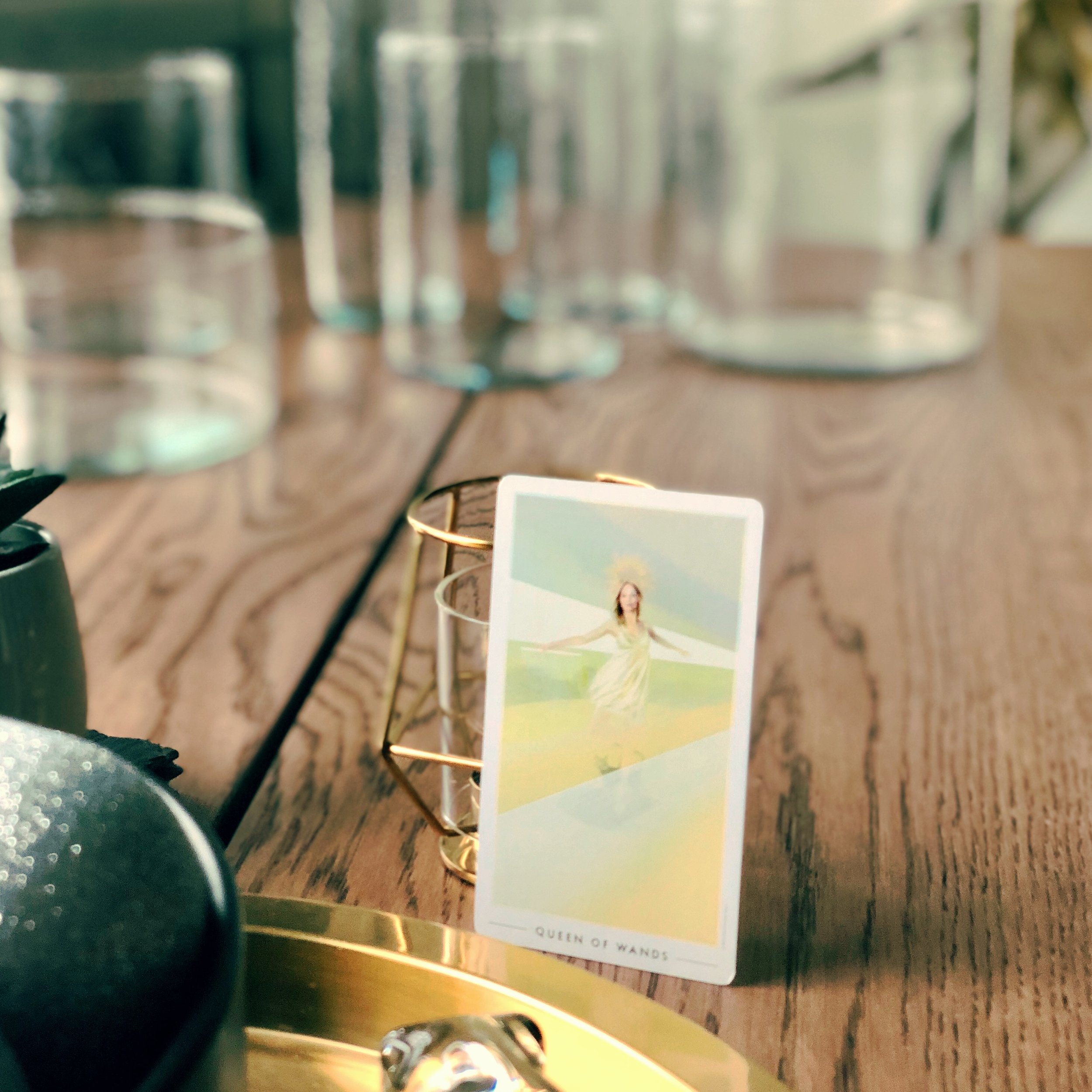 The Queen of Wands is an energizing but comforting source of inspiration, the perfect muse.