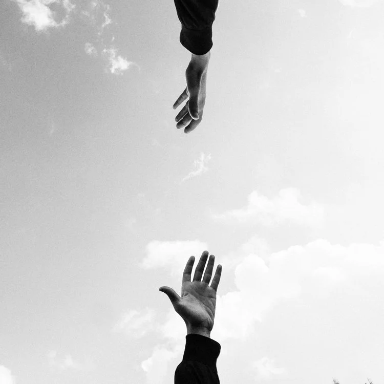 Hands Reaching Out for Support