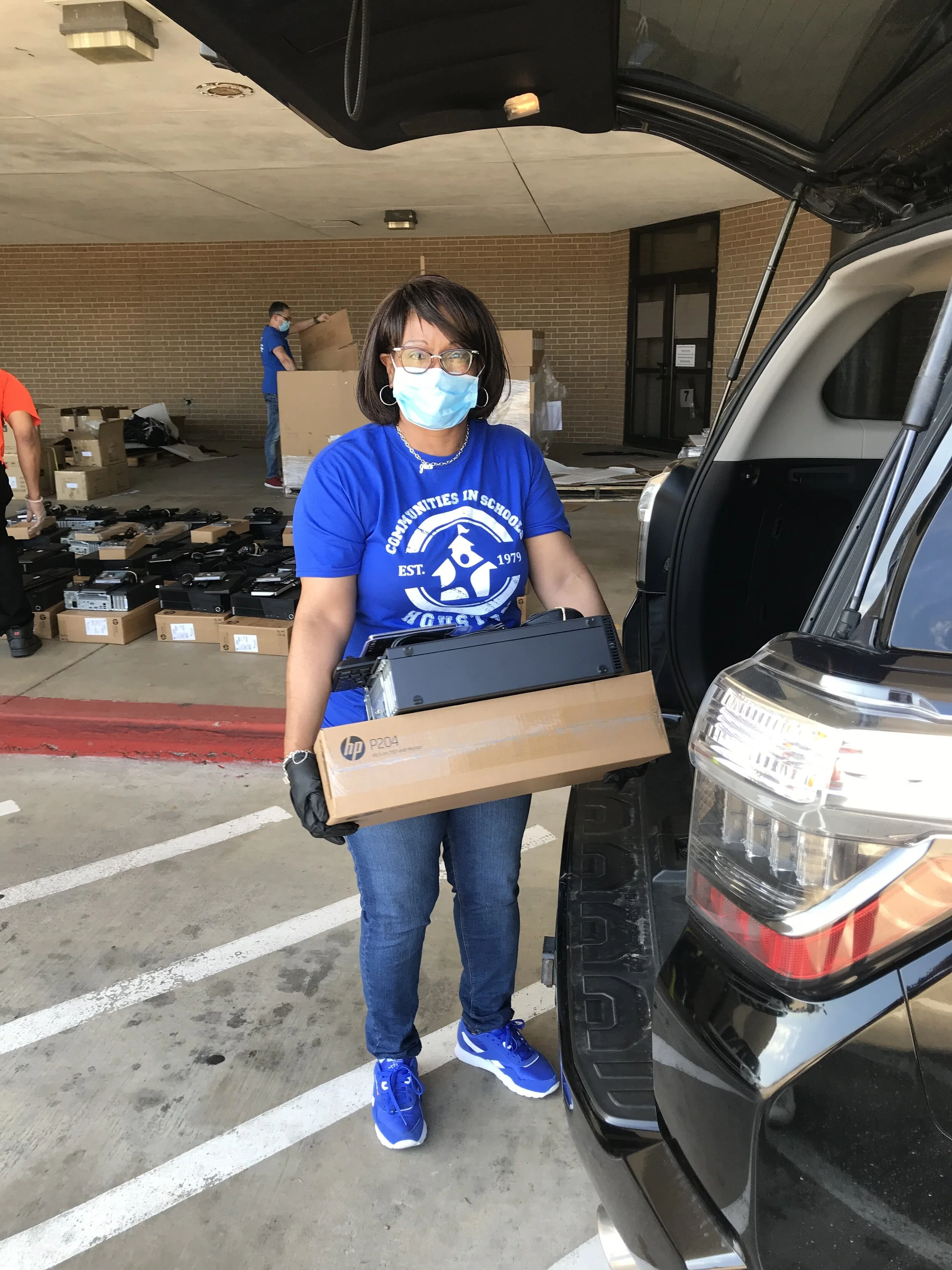  CIS and Comp-U-Dopt Partner to Provide Computers to Students