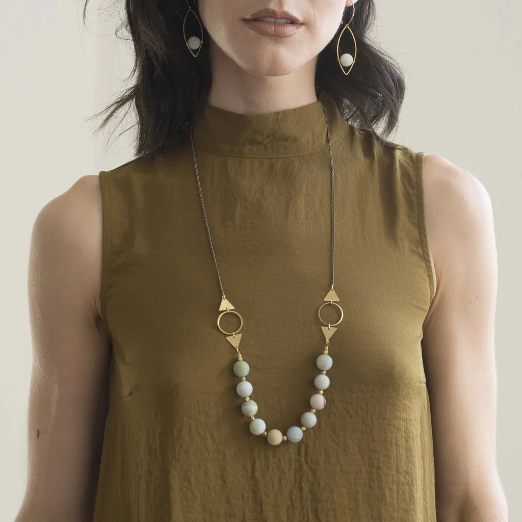 shapeshifter necklace on model.jpg