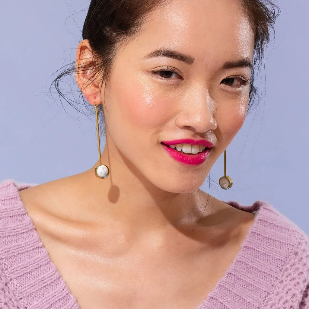 aberrant earrings on model.jpg