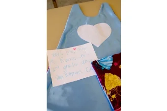 Volunteers make 'superhero capes' for children in Oklahoma