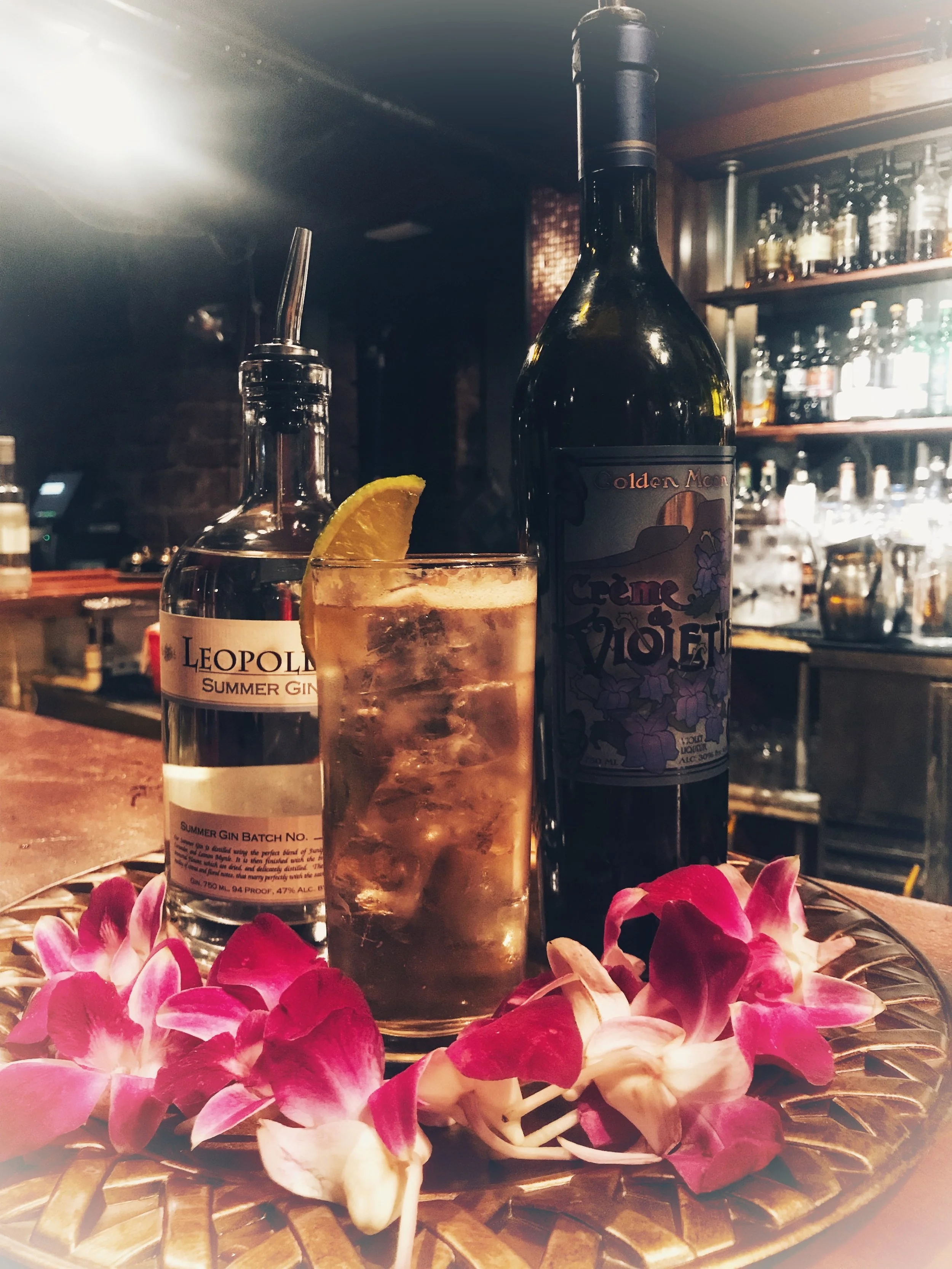 Leopold's Summer Gin (1.5 oz) Golden Moon Creme de Violette Liqueur Tonic Water Lime