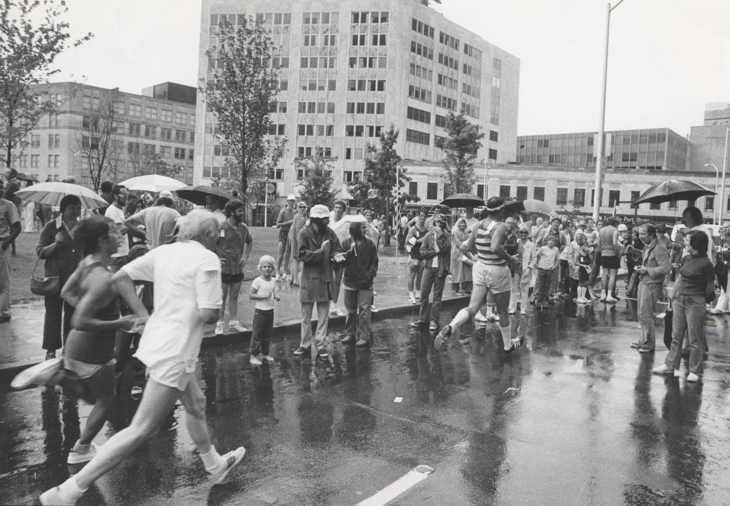 Runners run an "official" 10K for the first time in 1974