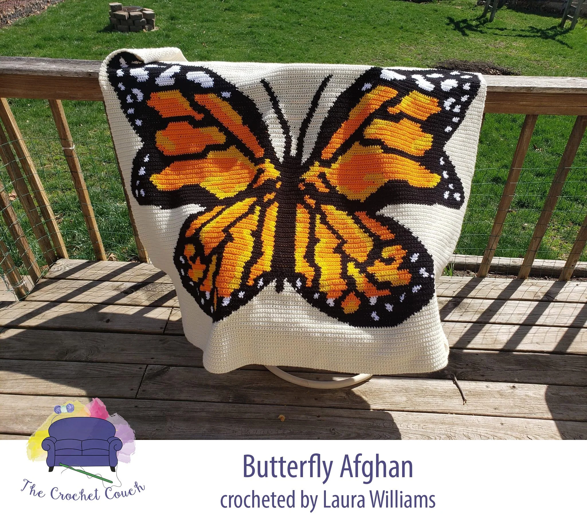 A vibrant single crochet afghan featuring a detailed monarch butterfly design. The butterfly's wings showcase rich orange and black colors with white accents
