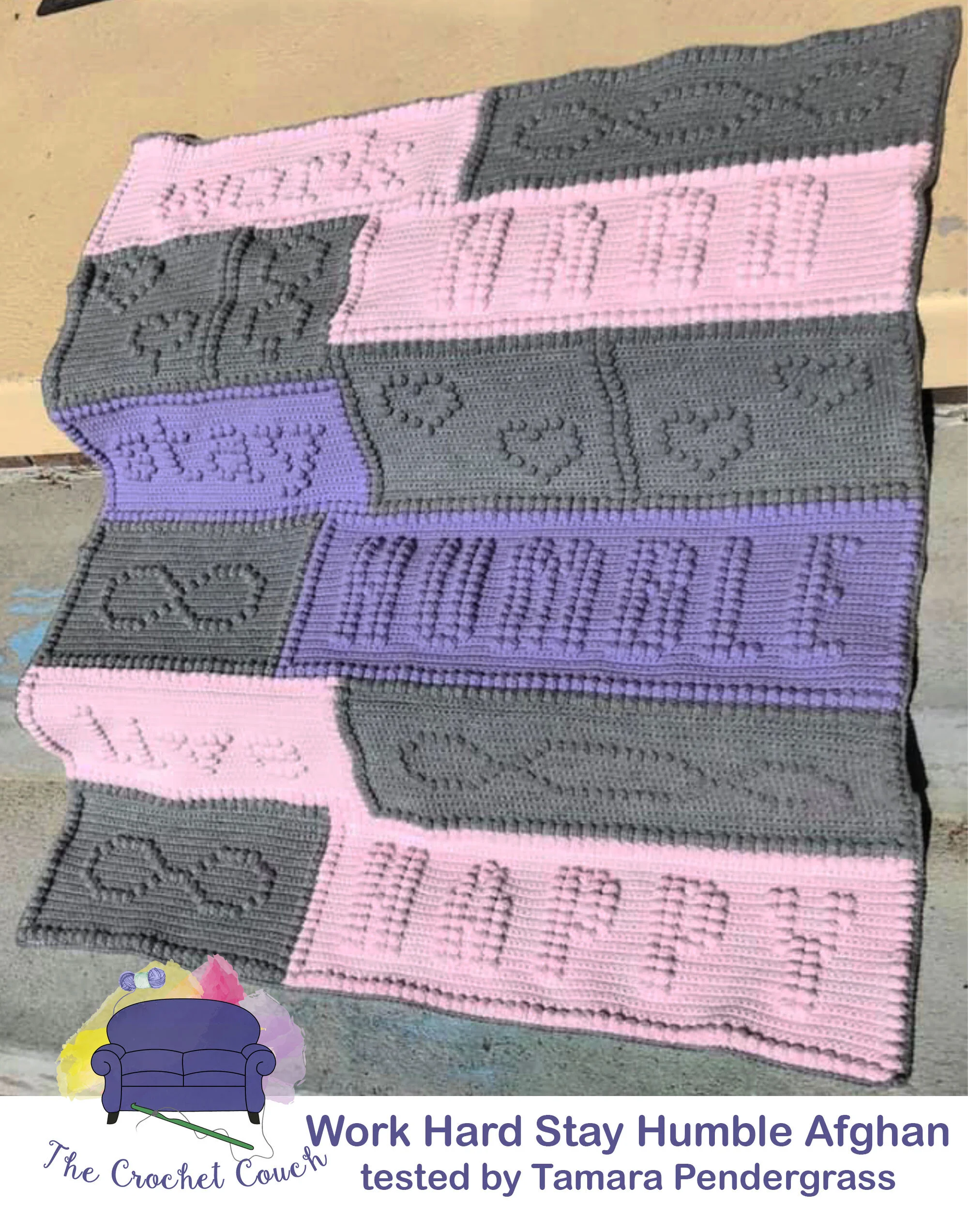 Crocheted afghan laying on outside steps, bobble stitch in gray, pink and lavender and says work hard, stay humble, live happy.  Afghan crocheted by Tamara Pendergrass