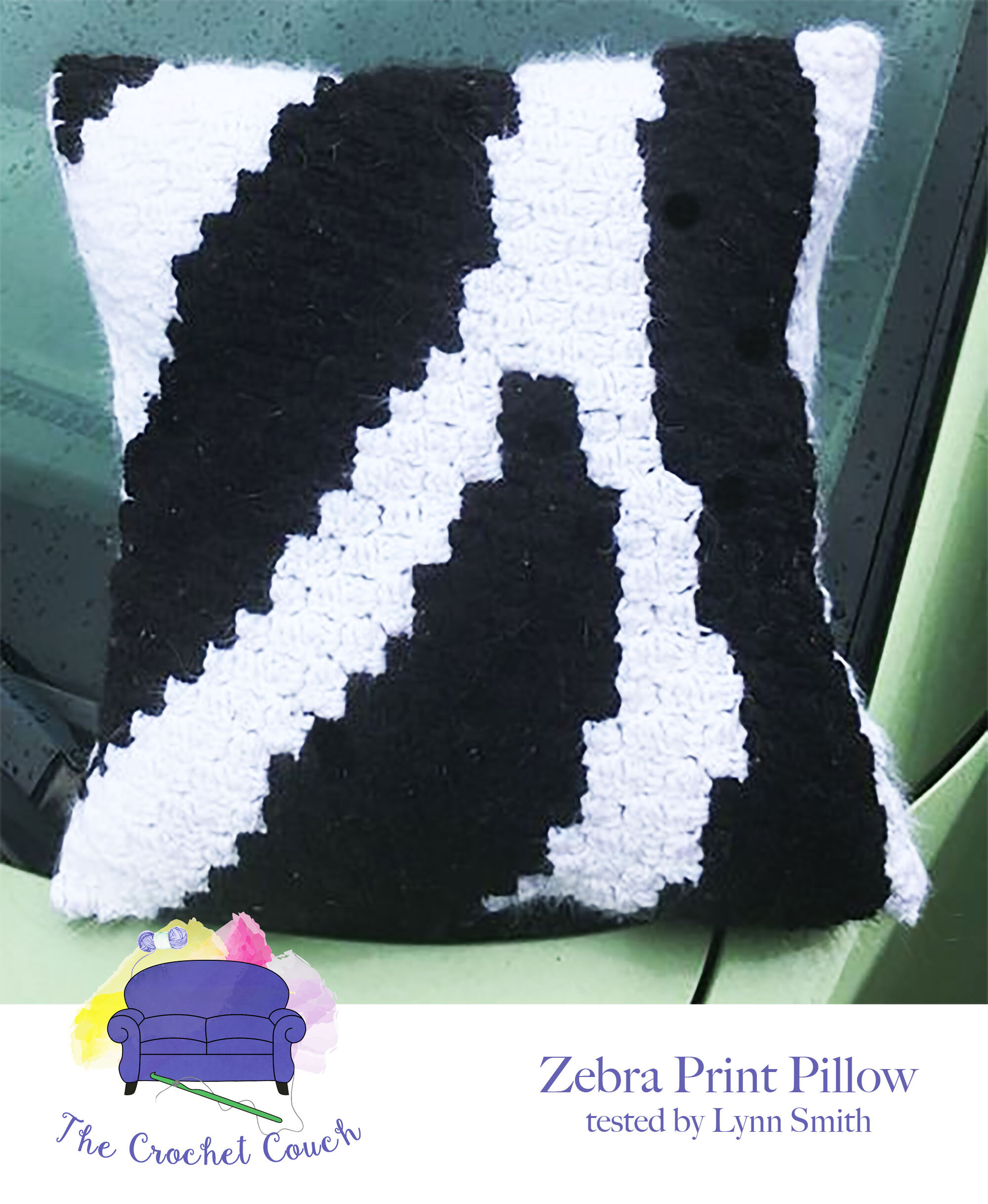 A square black and white crochet pillow with a bold, modern design featuring a striking contrast pattern.
