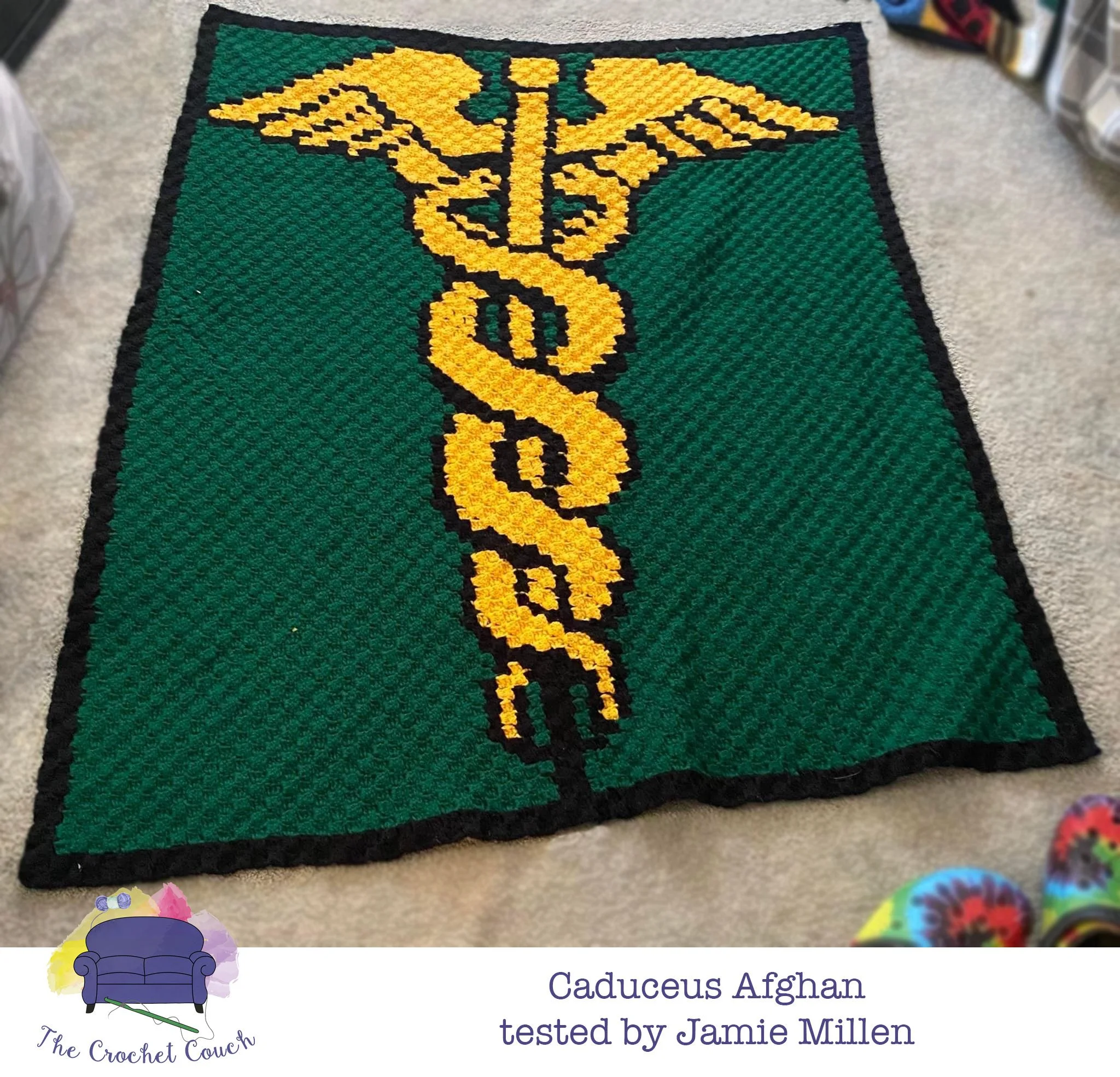Caduceus Symbol Afghan, a C2C afghan done in gold, green and black  by Jamie Millen.