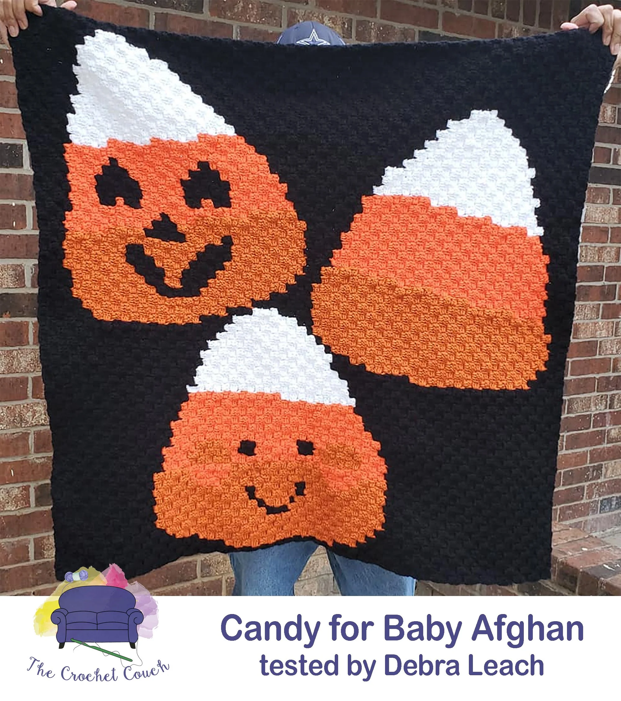 Candy Corn Afghan,  sized for babies and kids.  Black background and candy corn in orange and white - crocheted by Debra Leach