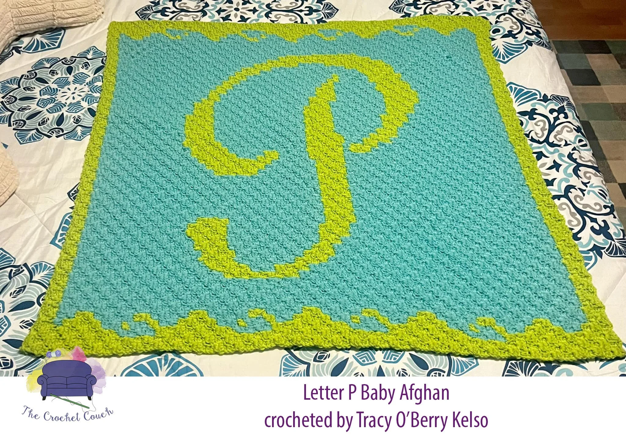 A crochet Letter P Baby Afghan in a C2C design. The original pattern is in pink and white, while the finished afghan by Tracy O’Berry Kelso features a blue and green color scheme