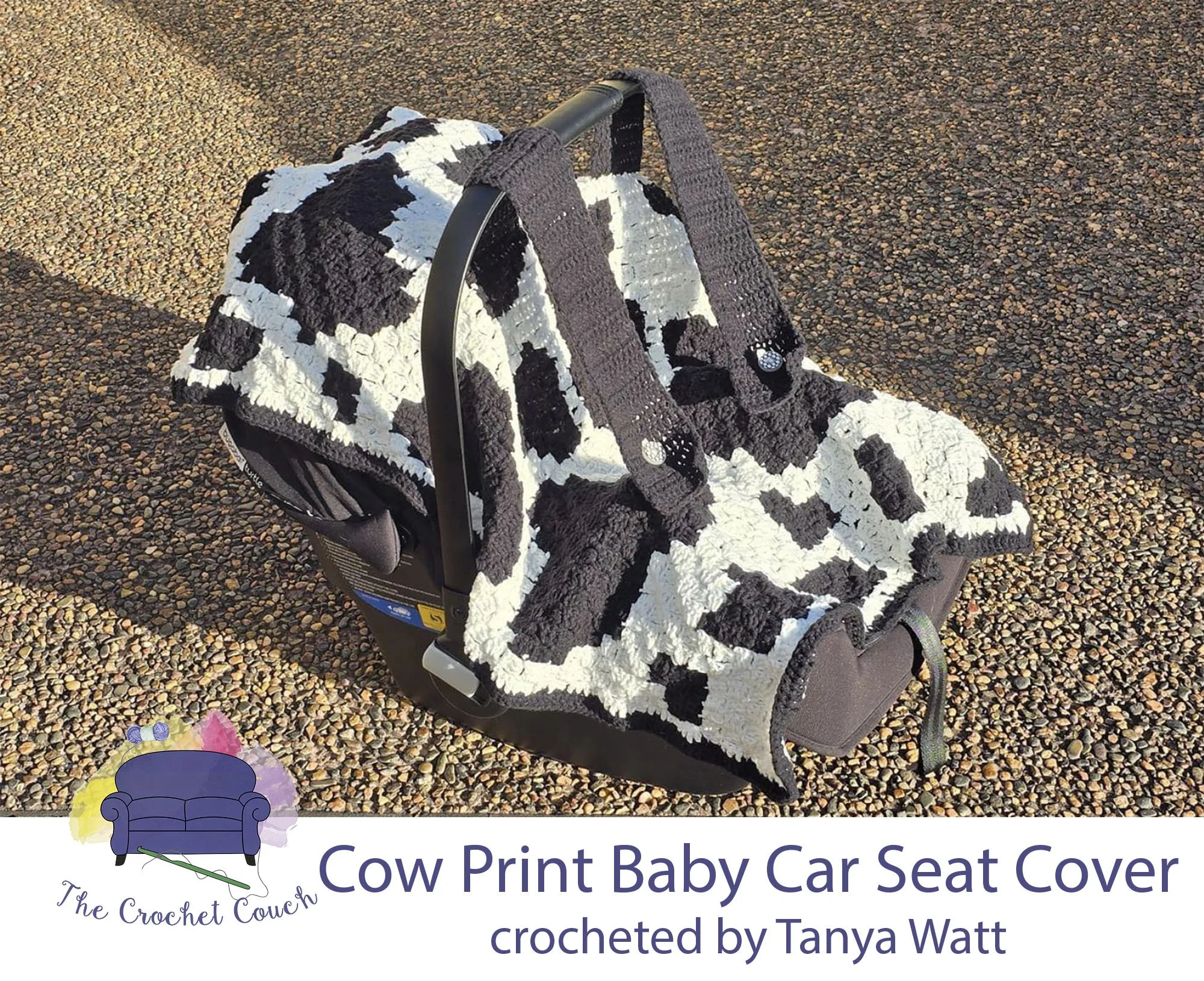 Crocheted Cow Print Baby Car Seat Cover is shown on car seat sitting in driveway.  The Car Seat Cover is crocheted using C2C and done by Tanya Watt