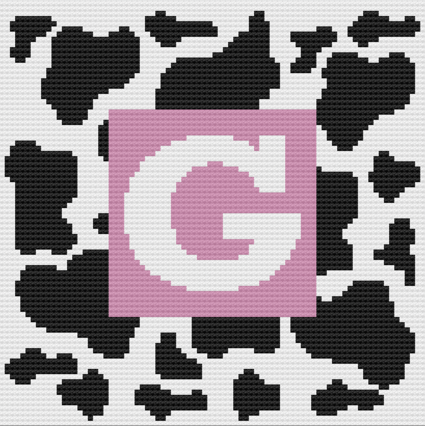 Crocheted afghan with black cow print spots on a white background. A large pink square with a bold white letter "G" is centered in the design for a monogram effect.