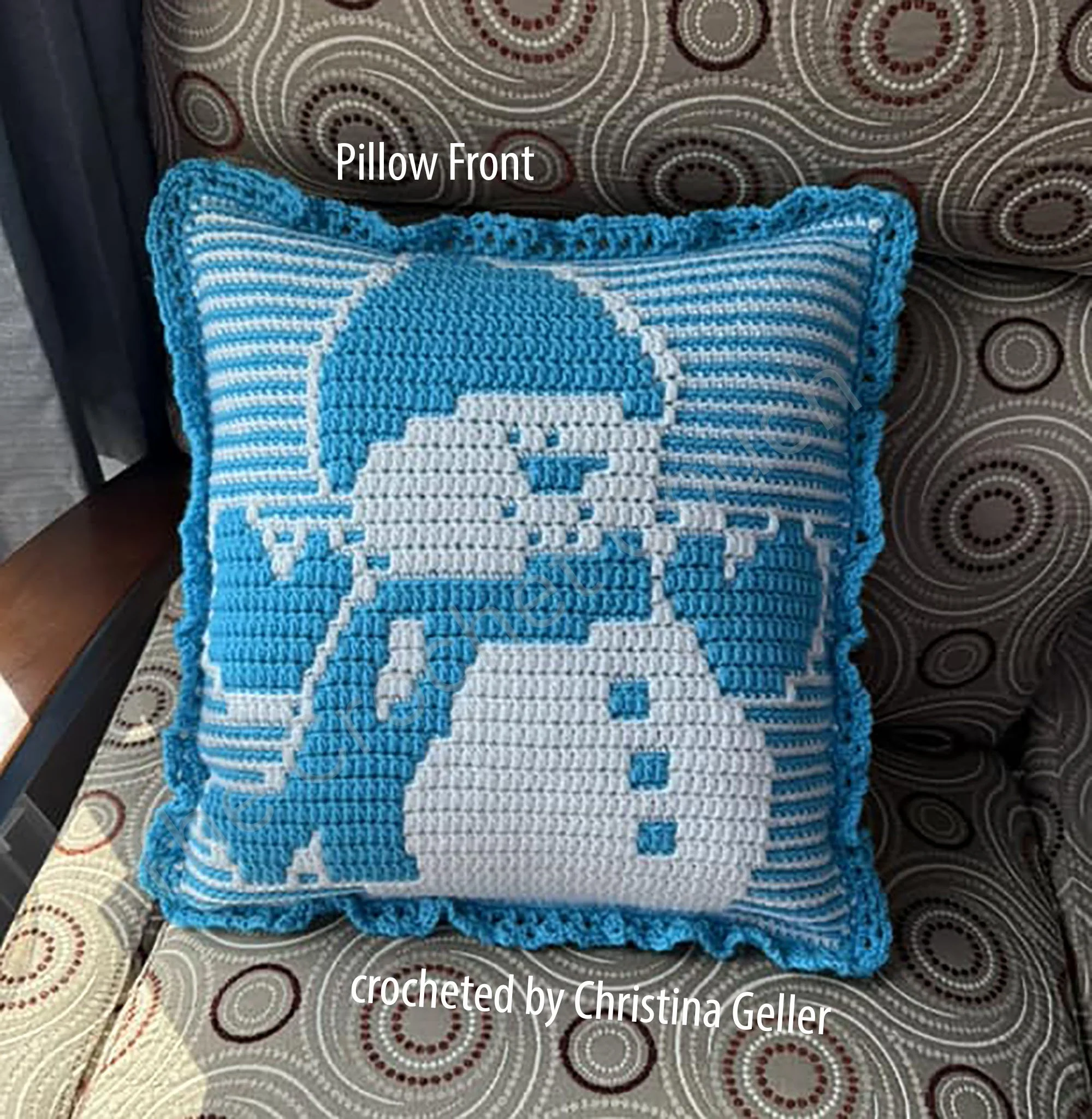 Front view of a handmade Snowman Mosaic Pillow with a cheerful snowman design in blue and white.