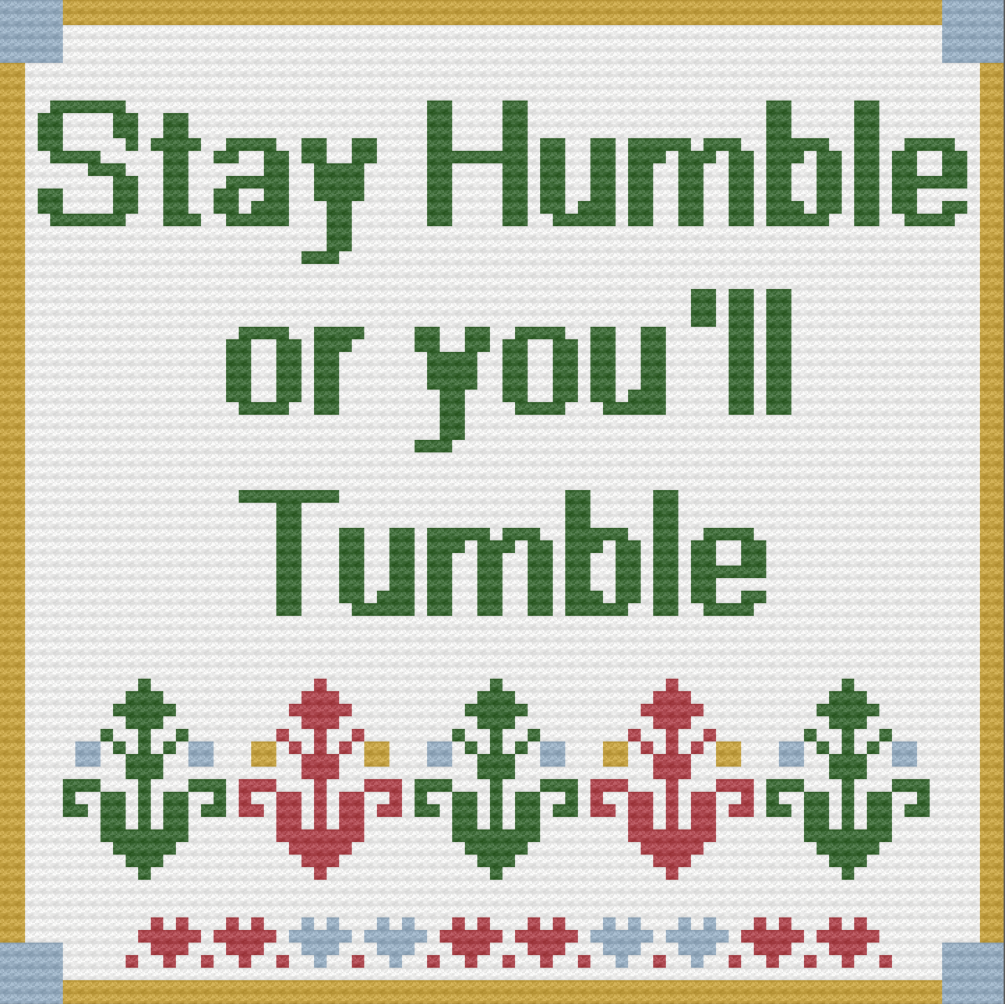 A completed crochet afghan with the phrase "Stay Humble or You’ll Tumble" in green text, featuring a decorative floral border in red, green, and blue.