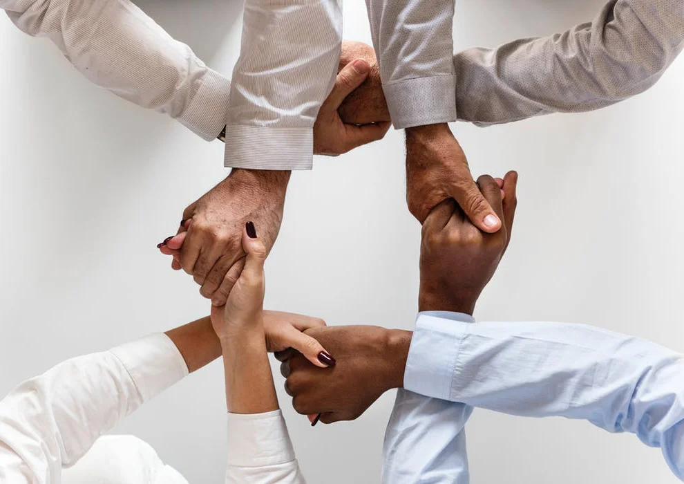 pexels-photo-943630 collaboration hands intertwined.jpeg