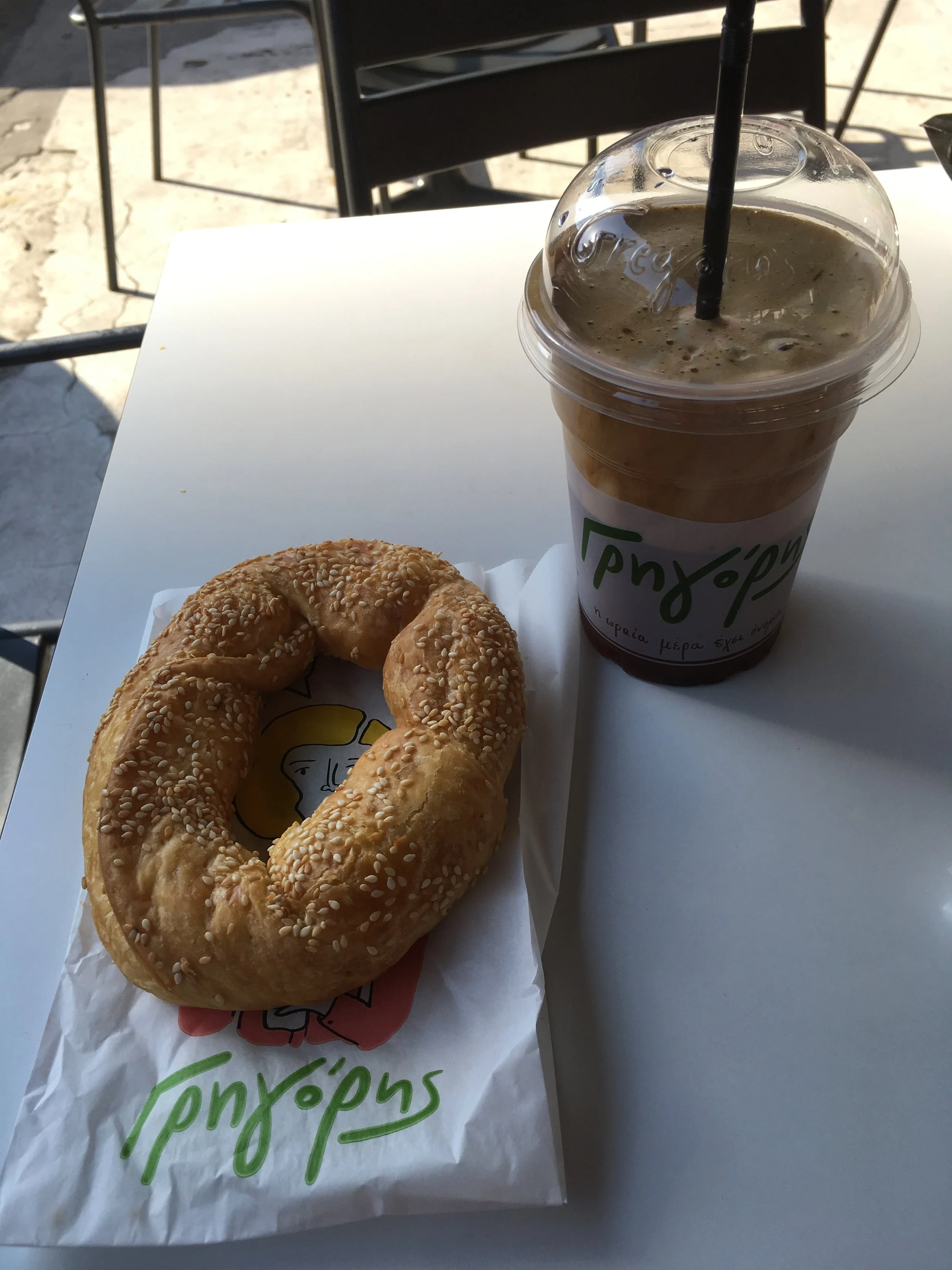  Breakfast in Sparta. Cheese filled “bagel” and Nescafe latte 