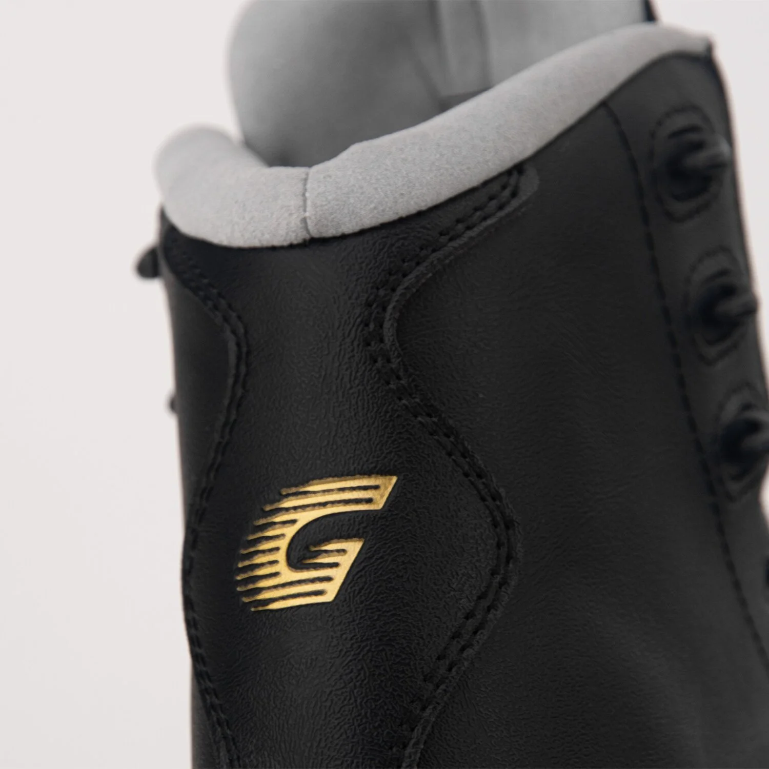 GRAF Tango black beginner figure skate with blade, view of G logo