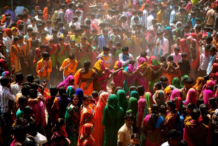 Tribals in Bakhatgarh village dancing during the colourful Bhagoria festival, which celebrates the  kharif  harvest just prior to Holi in spring | Source:    RuralIndiaOnline