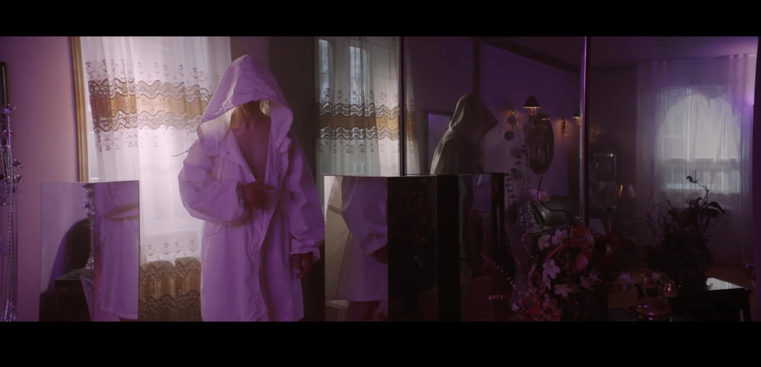 Hoodies at Night &amp; KROY - 4 Weeks - Classic Lace decoration plus blue and pink background reflected on a cut mirror.