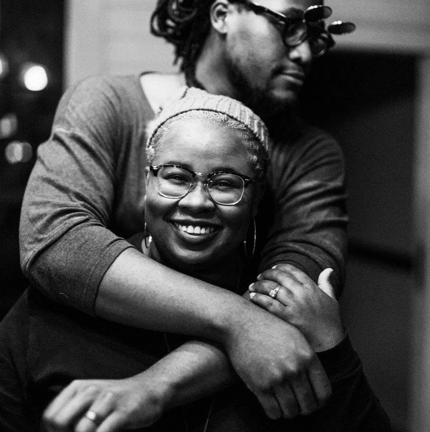 Shellane Brown | Suga Dealer + Co-owner Wife of owner, Daniel Brown & Founder of Apple-Butter Bakery. Besides making sure things are taken care of behind the scenes, she also finds time to create beautiful cakes as the sugar artist & co-owner of Apple- Butter Bakery & the master mind behind gilly's dessert programs. She enjoys decorating cakes and singing... preferably loudly and at the same time. Some days you'll catch her at the bar chatting with customers, most days you can find her giving long hugs, laughing very hard & cheering for us, holding her title as our number one supporter. Word around town is The Browns will be joining forces in a new location lead by Shellane & her Butter Team, at a new development being stapled as “the number one culinary block of South” @ pinewoodforest Keep up with her adventures on Instagram: @applebutterbakery