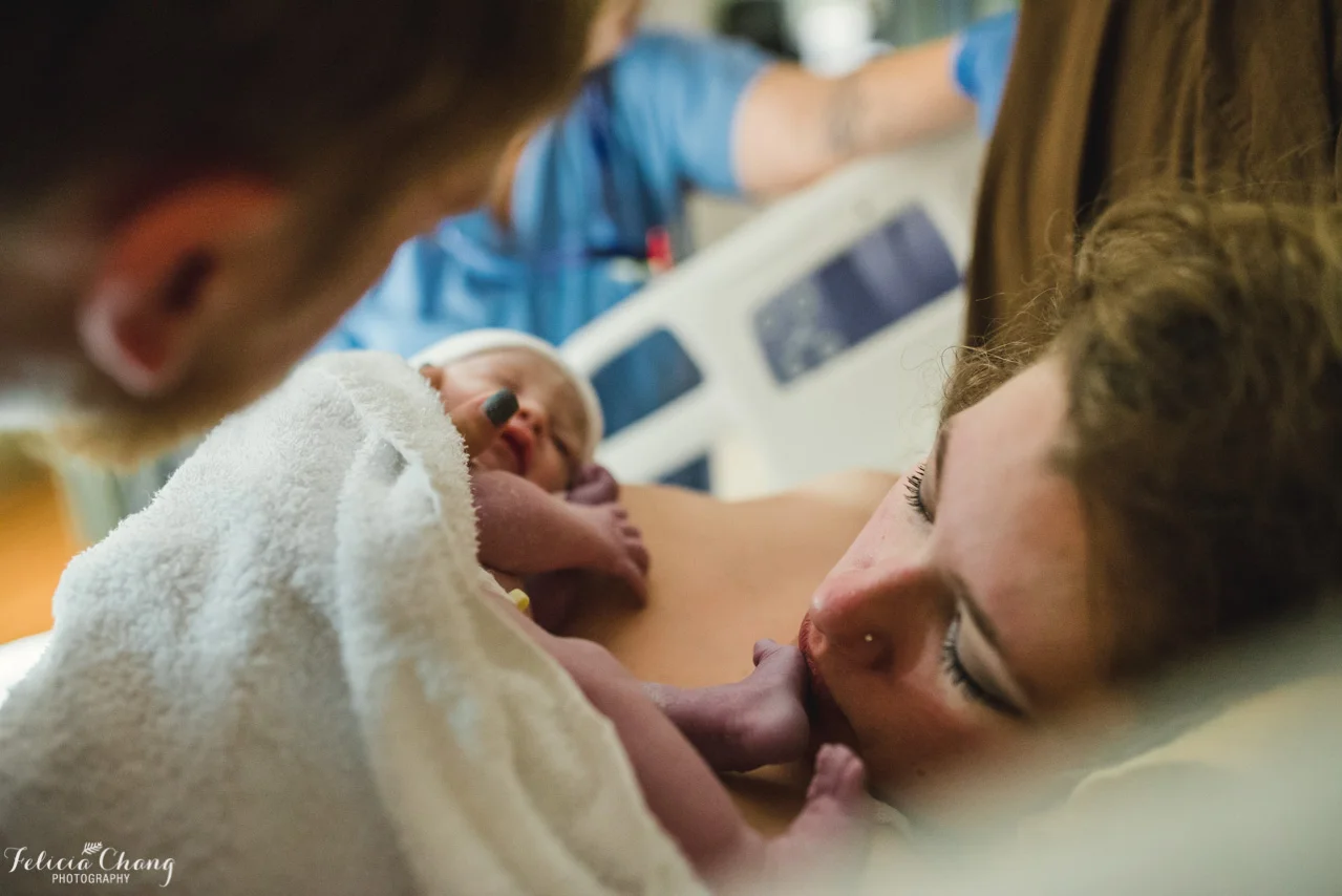 Vancouver Birth Photographer | A baby girl surrounded by love